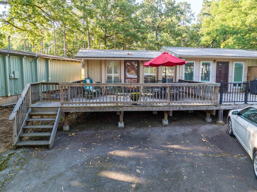 Welcome to your fully furnished 1 bedroom, 1 bathroom condo on Lake Hamilton! This charming retreat boasts a scenic view of the lake and offers a range of amenities for your enjoyment. Take in the breathtaking sights from your own private balcony and soak up the tranquility of lakeside living. The condo features a well-appointed kitchen, a spacious living area, and a cozy bedroom. Dive into the refreshing pool or launch your boat from the convenient boat launch, both just steps away from your doorstep. With its close proximity to Lake Hamilton amenities, restaurants, and shopping, this condo provides the perfect balance of relaxation and convenience. Don't miss the chance to own this ideal waterfront getaway! Condo features a stacked washer dryer for your convenience.