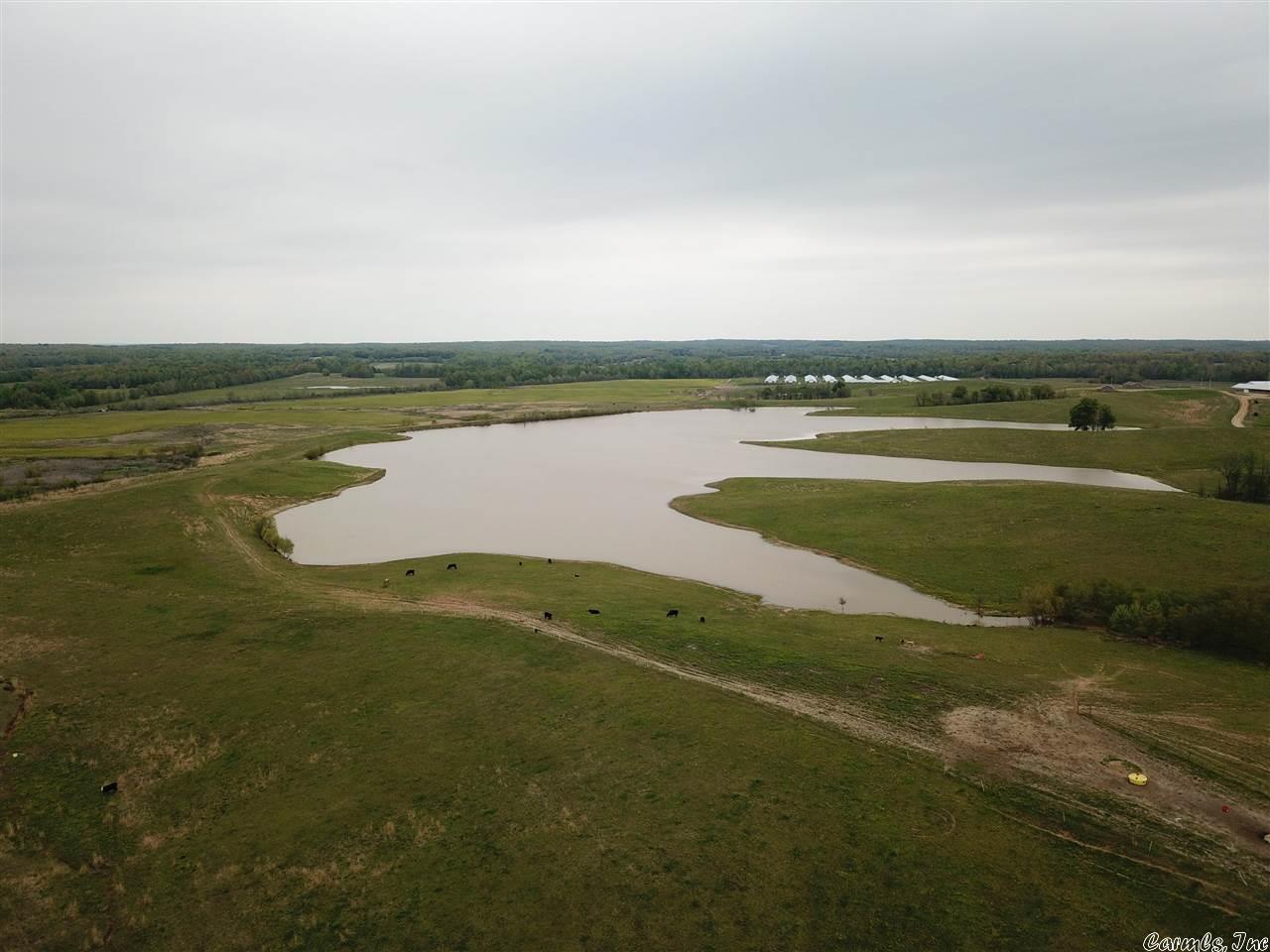 1070 +/- acres of fenced and cross-fenced native grass pasture. Consisting of 8 total pastures with 14 ponds including a 40 acre lake, two creeks and completed with a working facility containing 8 piped pens and a hydraulic squeeze chute. Loaded with wildlife and buildsites on every hilltop there is something here for everyone. Seller will consider subdividing.