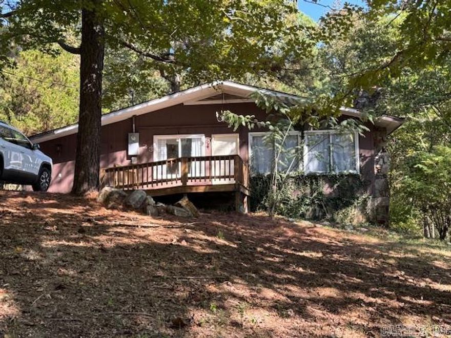 PARTIALLY RENOVATED HOME ON .71 ACRE! 1462 square foot home has 3 bedrooms and 1 recently remodeled bathroom with double sink and granite countertops. Kitchen with pantry, coffee bar and dining room and living room combo. Huge laundry room. Rock hearth and fireplace with wood burning insert. The home is handicapped accessible with front ramp, wheelchair accessible kitchen sink and spacious open floor plan. New roof in 2023 and new central heat and air in 2017 and new flooring and bathroom in 2022. The home is all electric with average bill being $140 with stove, refrigerator, washer and dryer all staying. Home sits on .71 of an acre surrounded by woods. Just 30 miles from Pocahontas close to lakes and rivers!