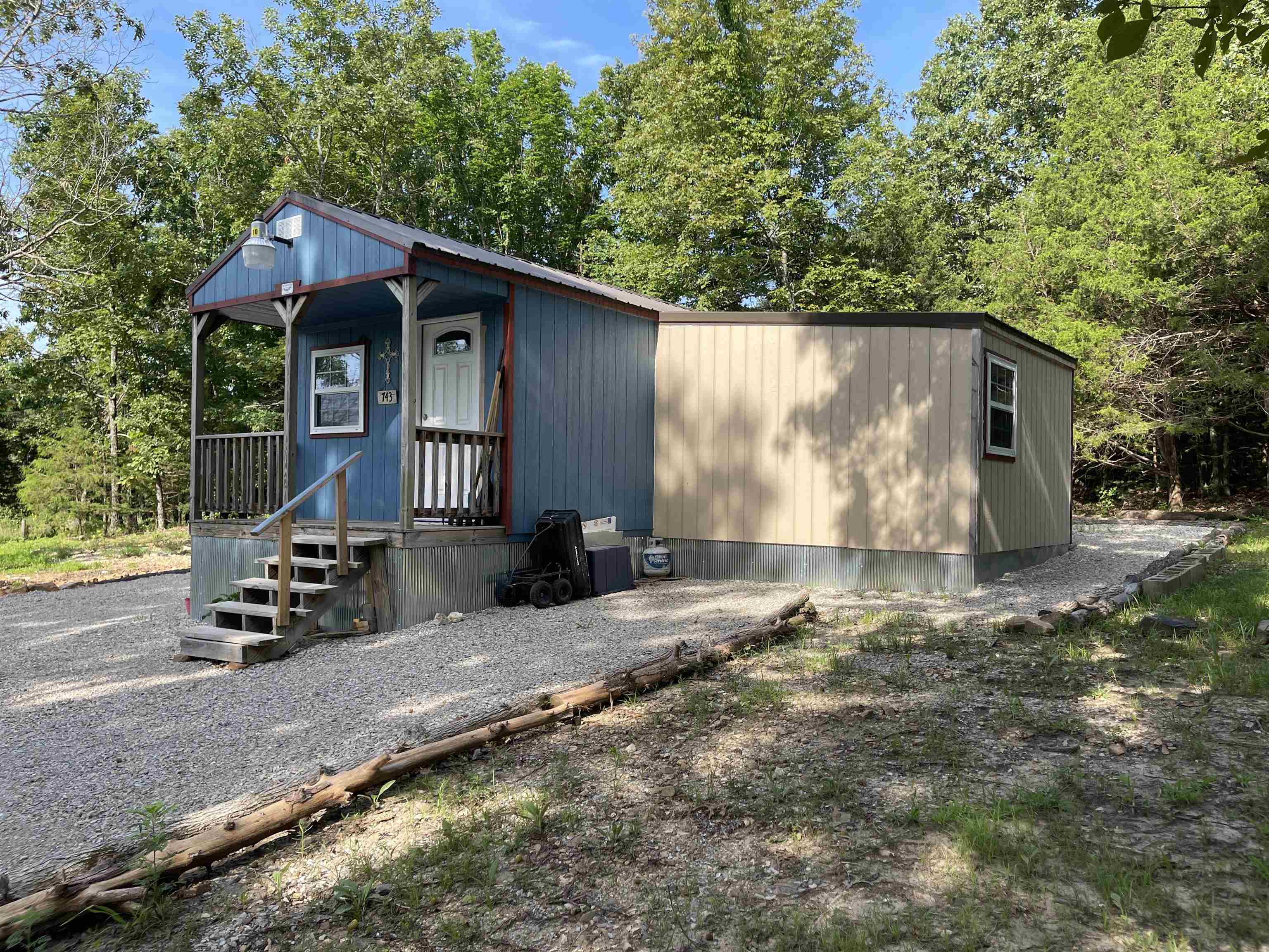 Tiny Cabin Living Meets Big Opportunity! Check out this charming 400 sq ft cabin nestled on 2.43 unrestricted acres in the beautiful Ozarks — the perfect blend of comfort, convenience, and flexibility! Whether you're looking for a cozy home base, weekend retreat, or RV-friendly setup, this property has you covered. Upgrades & Utilities Galore: Two water meters Electricity on site, plus plug-in at the pole New 1000-gallon septic tank 30 & 50 amp RV hookups – bring your camper or tiny home! Reem hot water heater Rockwool mineral wool insulation for energy efficiency All PEX water lines run inside the cabin – no freezing worries! High-speed fiber internet – work remote or stream with ease The land is surveyed and unrestricted, giving you the freedom to build, expand, garden, or just relax under the stars. Rural water access adds even more peace of mind. Priced to sell at $89,900 – a rare find with this much potential and infrastructure already in place! Don’t miss out – schedule your private showing today and start living your country dream!