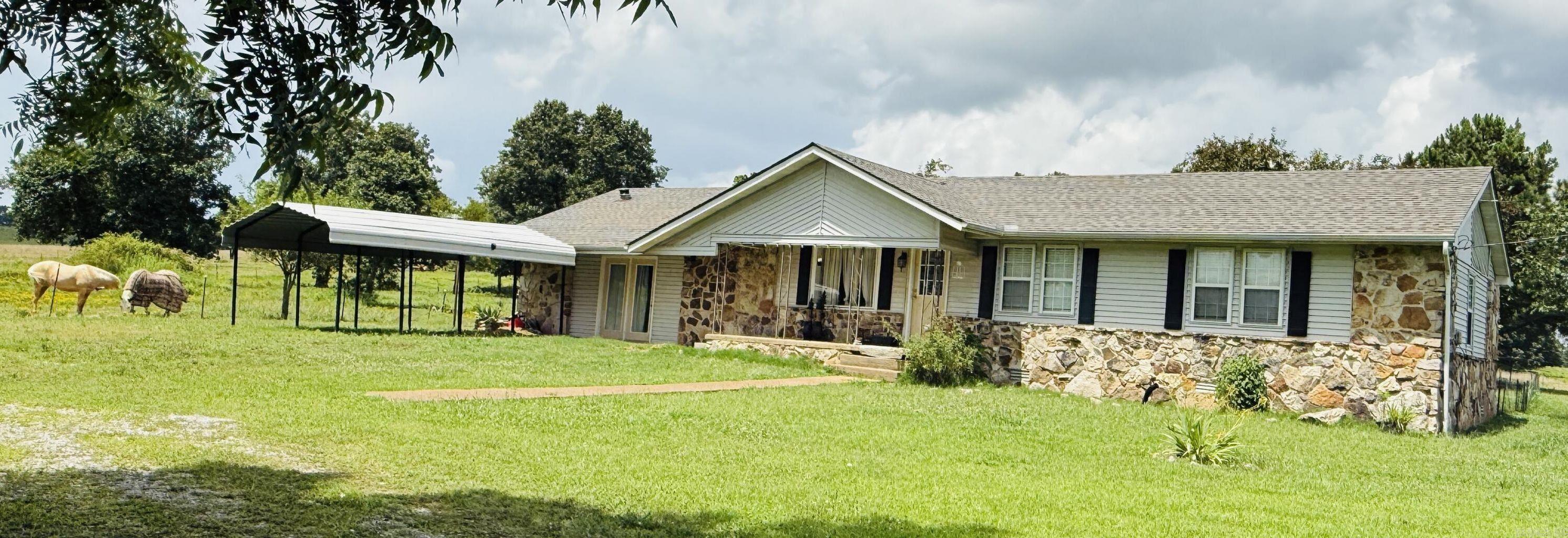 MINI HORSE FARM! New Roof!! This mini-farm just waiting for you! 4 Ac of fenced pasture, a barn with a tack/feed room and an attached loafing shed, and 2- 10 x 10 horse stalls. A small stocked pond sits in the pasture that never goes dry. This rustic house boasts a NEW ROOF, new appliances, a large family room, fruit trees, a chicken coop, 2 wells, and a roomy storm shelter. Beautiful, peaceful setting on a paved road. Perfect place to ride horses, ride ATV's, fish, and enjoy country life. Close to several towns and minutes away from Norfork Lake and all the amenities and outdoor activities the area has to offer. Come and see this unrestricted property and make it your forever home! It's just waiting for your personal touches!
