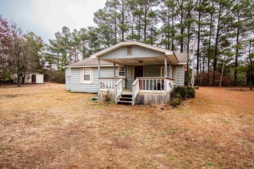 This comfy starter home is a great rural area out of town. The home features 3 bedrooms, 1 bathroom and a wooden shiplap living room. All nestled onto .8 acres you have plenty of yard. Easy access to a major highway and conveniently located between pine bluff and star city.