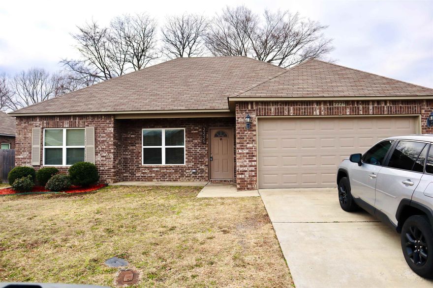 This charming brick home features 3 bedrooms and 2 bathrooms with an open, split floor plan perfect for modern living. The spacious kitchen boasts stainless steel appliances, and the home includes a separate laundry room for added convenience. The master suite offers a walk-in closet and a private bathroom. The fenced-in backyard with a concrete patio provides a great space for outdoor relaxation. Located in a welcoming neighborhood, the home has a well-maintained exterior and a tasteful color scheme throughout.