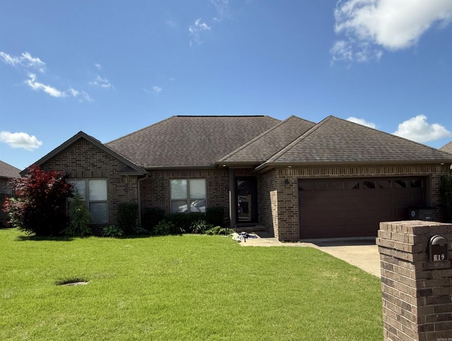 Enjoy spacious living in this lovely home featuring an open-concept living and kitchen area with beautiful hardwood floors. The modern kitchen with white cabinets, granite countertops, and stainless steel appliances. Relax on the back deck overlooking a fenced backyard, perfect for outdoor enjoyment. Includes a well-appointed bathroom with a walk-in shower and ample storage. Comfortable bedroom with hardwood floors and great natural light. Attached garage for convenient parking.