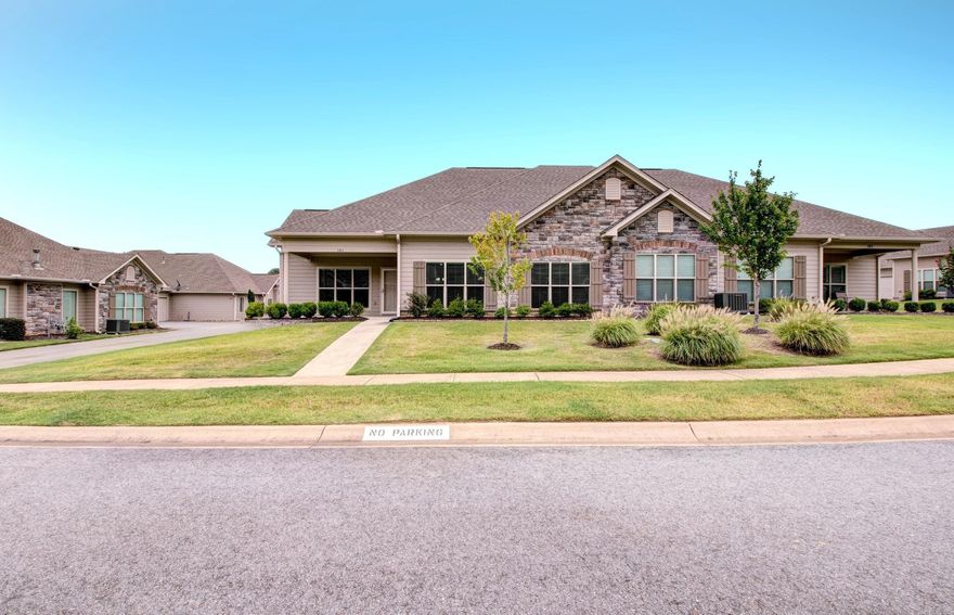 ABSOLUTELY PRISTINE CONDITION!  This home is in tip top shape and all rooms are very spacious.  Wonderful layout with large living area that opens to dining and  kitchen area which has beautiful stained cabinetry, granite counters, and refrigerator that conveys.  Separate office/formal living is a wonderful addition to this layout.  Primary suite is lovely and has an ensuite bath with dual vanities and walk in shower, built-in linen cabinet, and fabulous closet.  Spare bedroom is separate of primary suite and has access to wonderful full bath. You will love the convenient laundry room off garage (near kitchen) with folding area and shelving.  This is a lovely community with access to the Clubhouse, swimming pool, work out facilities and other amenities.  HOA takes care of roof, clubhouse, yard, exterior and termite.