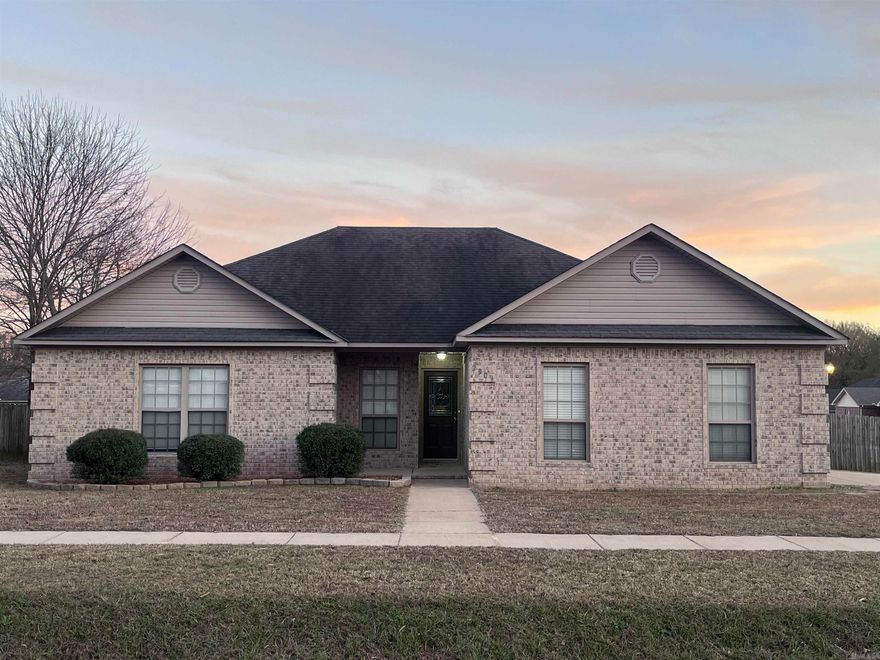 Charming 3 bedroom, 2 bathroom house on a large corner lot in the Cabot School District. Beautifully landscaped shrubbery and front porch nook perfect for watching the sunset. Minutes from the interstate - quick commute to Little Rock Air Force Base - and within walking distance to schools, ballfields and parks. This split floorplan house has tray ceilings, luxury vinyl plan flooring, oversized windows allowing for tons of natural light, plenty of storage space, and a separate laundry room with built in cabinetry. REFRIGERATOR INCLUDED. The master bedroom has a tray ceiling, and the bathroom has dual vanities, soaker tub, separate shower, and walk-in closet with built-in shelving. The backyard has a large concrete patio and privacy fence making it a great home for hosting friends or unwinding at the end of the day. This perfectly located house will not be on the market long!
