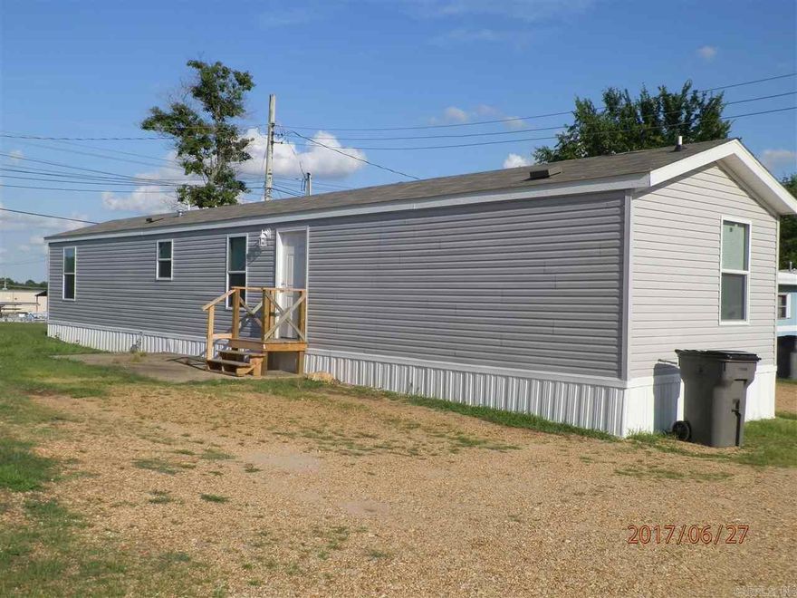 This newer mobile home with split floor plan has an open living/kitchen/dining area. Appliances furnished are electric stove, microwave, refrigerator and dishwasher. No pets. Rent includes water usage and lawn care. Tenant pays all other utilities. Interested persons must apply and pay application fee with Listing Office.