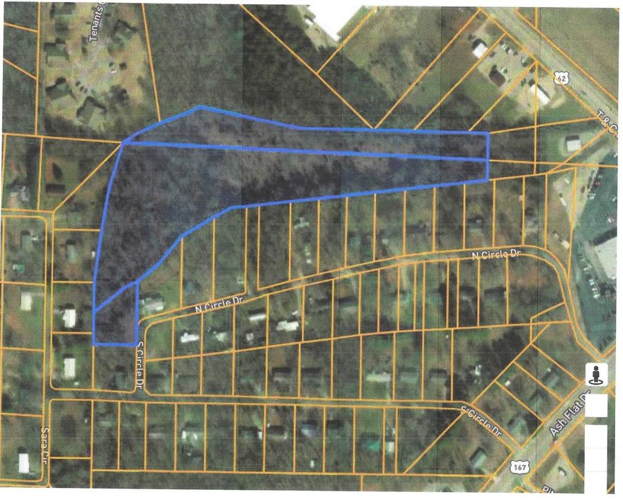 This 9 wooded acres is located in the middle of Ash Flat.  Purchase includes a lot in Northside addition on N Circle Drive to access the property.  Would be plenty of land to build your dream home or with city council approval and Planning and Zoning with Ash Flat, build a couple of houses for investment.  City ordinance allows for 2 horses, 2 cows, 6 goats or sheep or 20 fowl per 3 acres of land.  So you could have a mini farm on this property.  Call for written city ordinance requirements. City water and sewer are in this area, again subject to city approval.  Great location and this type of property does not come along very often in the city of Ash Flat.