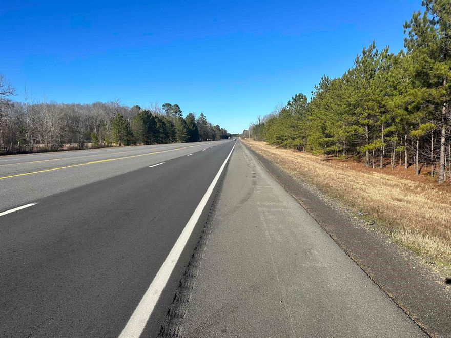 Great location for home site or development. This tract has lots of road frontage and is wooded. Call for more details!