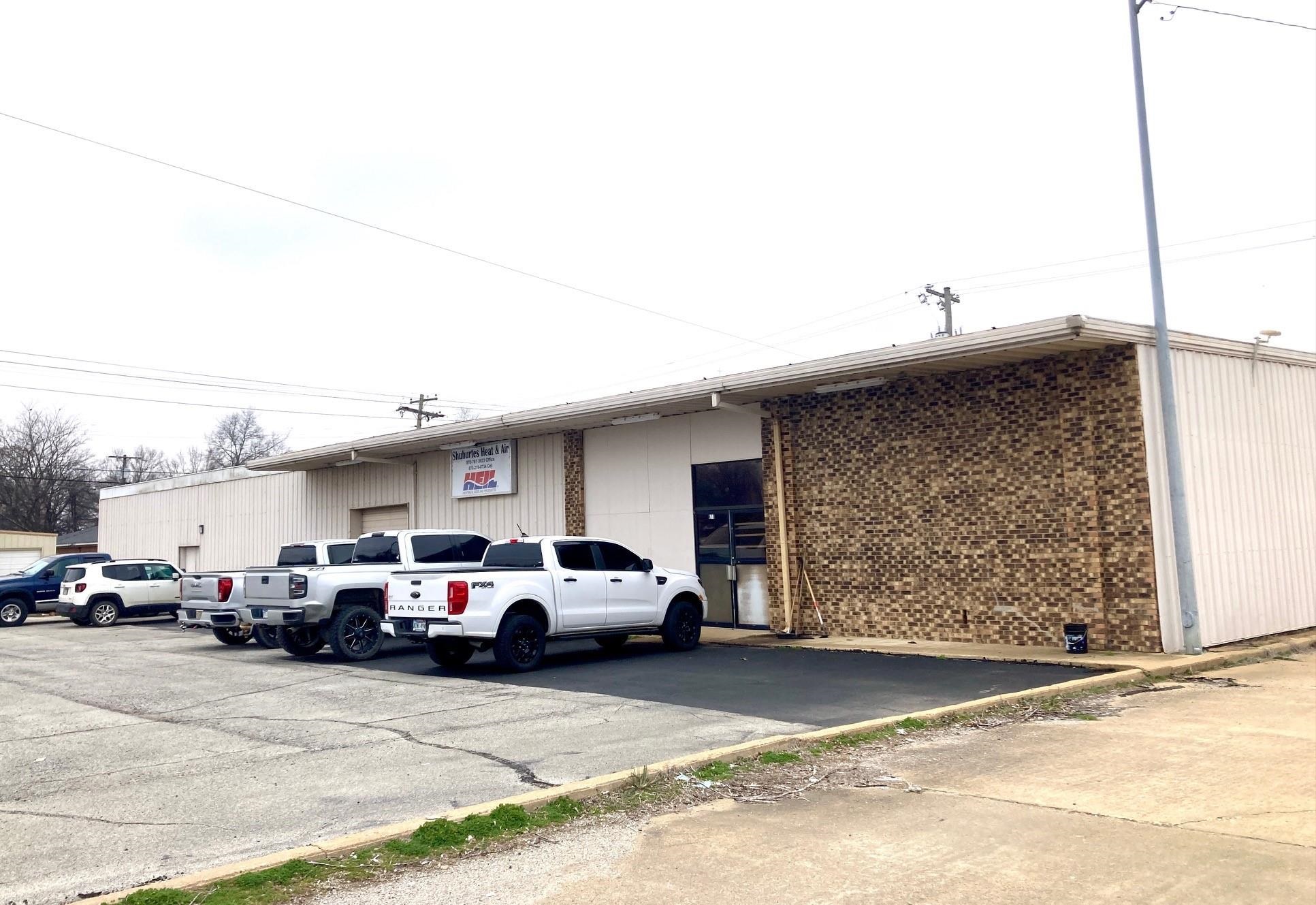 Lot is approximately 150' x 135'. Former grocery building that is industrial in nature. Heavy power, overhead doors, shop space, office space, and whse space. Ample parking for several vehicles.