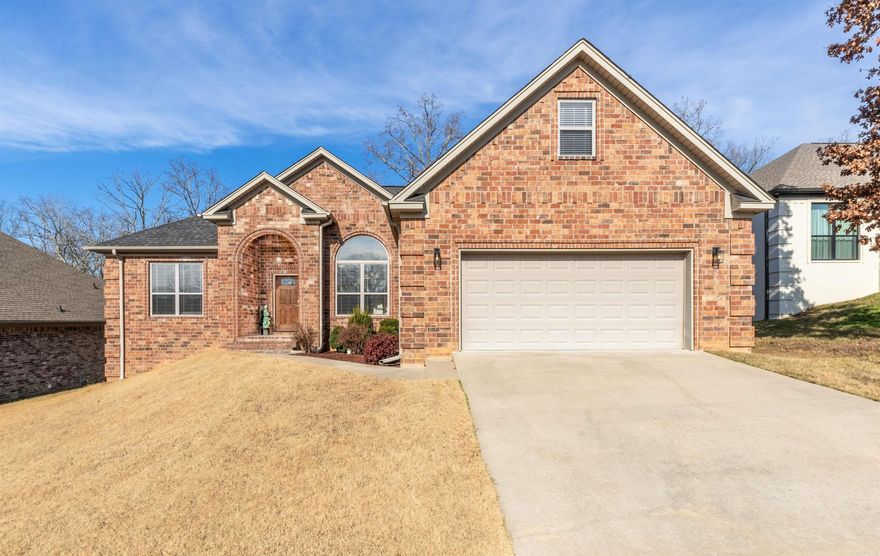 Charming 3-Bedroom, 2-Bath Brick Home in Sherwood!  Welcome to 3301 Village East Drive, a spacious 3-bedroom, 2-bathroom home offering 2,032 sq. ft. of comfort and style. Built in 2014, this home features high ceilings, elegant trimwork, and a versatile bonus room.  The eat-in kitchen boasts stainless steel appliances, granite countertops, custom cabinetry, and a breakfast bar. The cozy family room with a gas fireplace is perfect for relaxing. The split-bedroom layout provides privacy, with a primary suite featuring a custom walk-in closet, dual sinks, a soaking tub, and a separate shower.  Enjoy outdoor living on the large back deck overlooking a private, fenced-in yard. Seller is open to negotiating painting and has floor quotes available!  Don’t miss out—schedule your showing today!