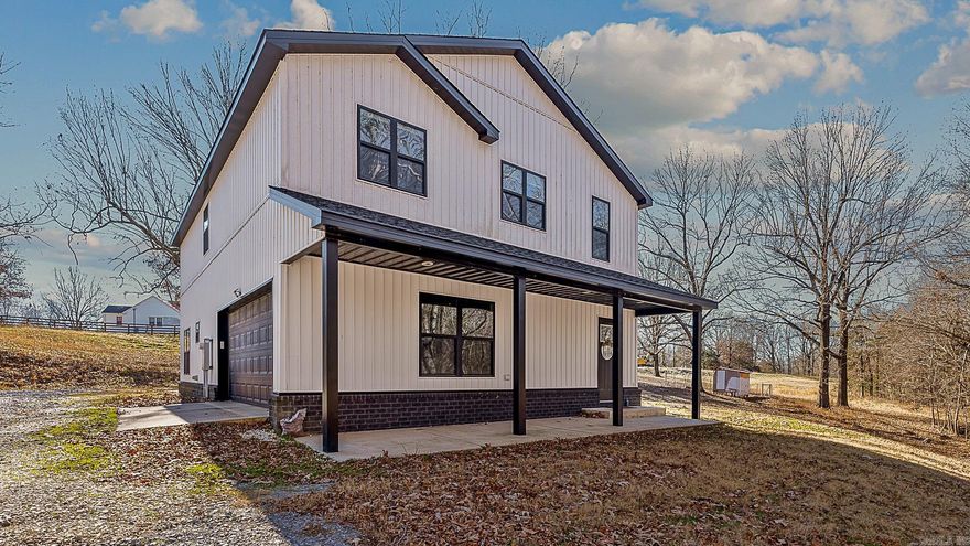 Looking for peace and quiet? Welcome to your farmhouse retreat on 21.8 acres  This home offers 4 bedrooms, 2.5 baths, and 2,200 sq ft of comfortable living space. The open-concept living room and kitchen feature a dining area and breakfast bar that is perfect for everyday living and entertaining. Upstairs, you’ll find the primary suite with a private bath, along with three additional bedrooms and a full bath.The laundry room is conveniently located upstairs as well with all the bedrooms!  Step outside to the back porch, ideal for grilling, unwinding, or soaking in the serenity of country life. And the land? Simply incredible. Pasture areas, a pond, plus fencing in the back of the land making it ideal for horses or cattle. Wildlife lovers will appreciate the abundance of deer roaming the property. Don't forget the storage building that will convey!