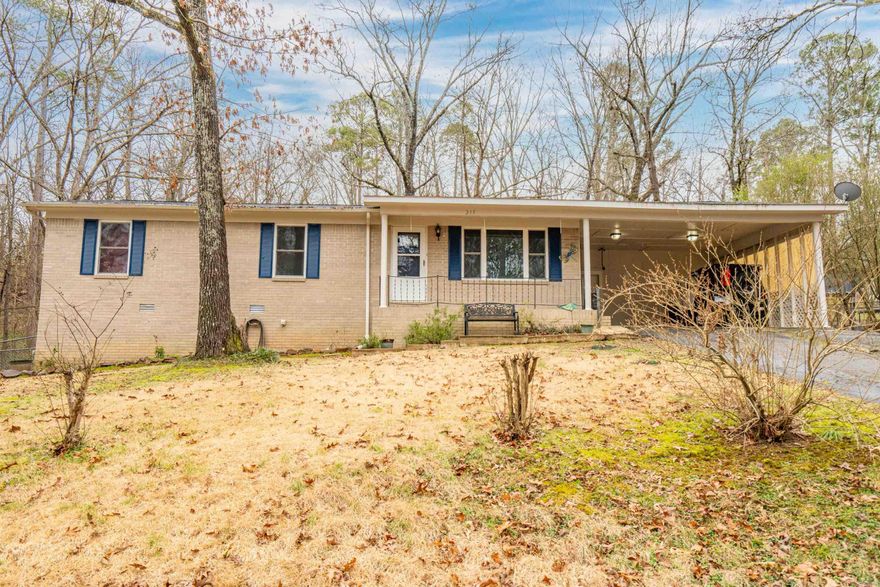 First time on the market in over 20 years. This one level home is sought after Lake Hamilton school district is ready for it's new family. Just mins from Hwy 70W, Wal-Mart Marketplace, shopping, dining, and drs. Hill Wheatly beach area just a few mins away.  The home features, three well sized bedrooms. Two fully bathrooms. Eat in kitchen with bar. Two living spaces. Situated on just under 1 acre. You have a fenced in backyard. Two car carport and large under house concreted storage space. Covered back patio. Come stake your claim today! Some updates include : Roof in Oct. 2020. Guest bathroom remodel in 2019. Electric panel replaced in 2019. Plumbing updates. New HA unit in Oct. 2018.