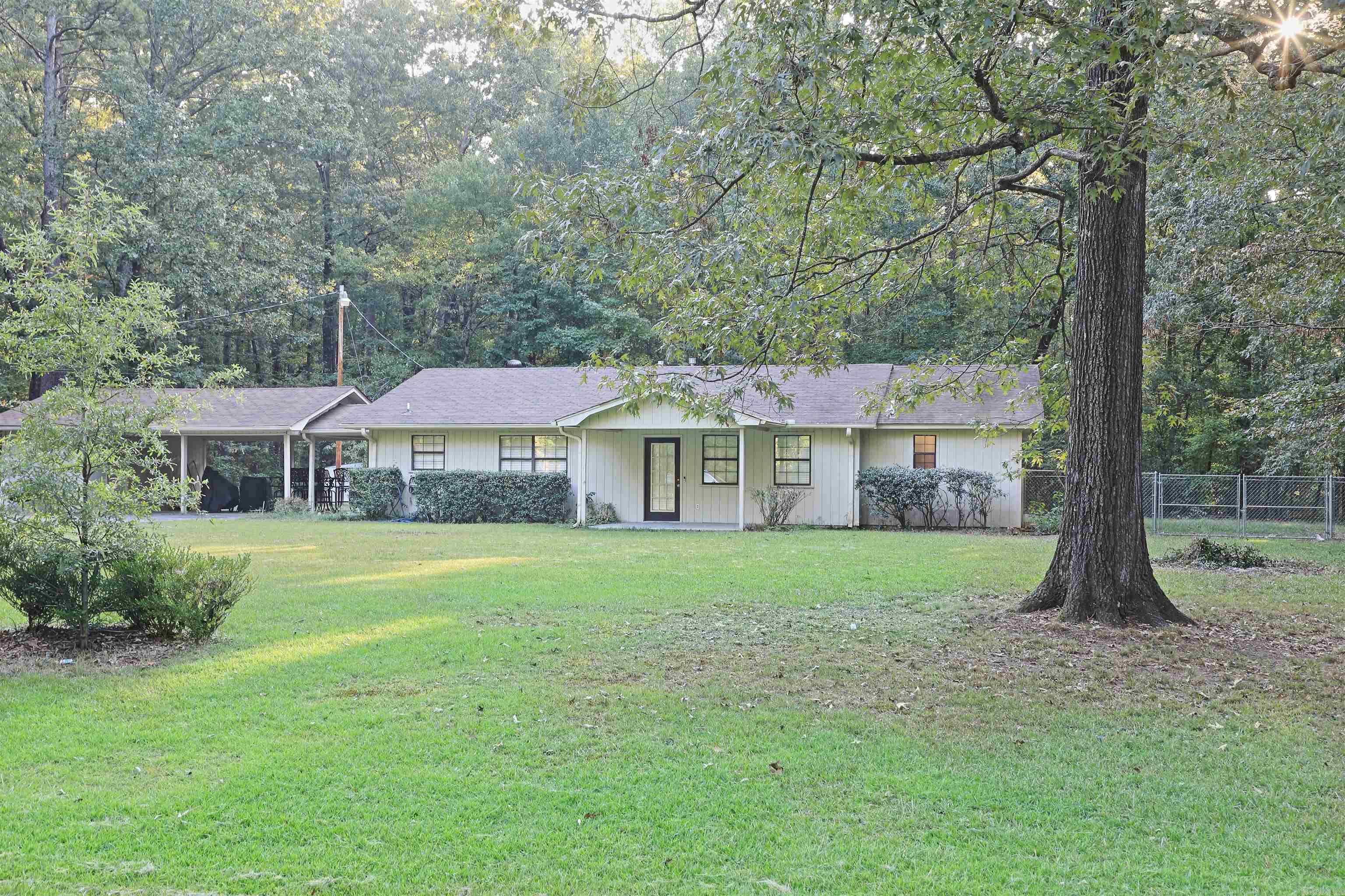 Peaceful Living Just Outside City Limits – USDA Rural Development Eligible! Welcome to this beautifully updated 3-bedroom, 3-bathroom home located just outside the city limits—offering peaceful country living with the convenience of nearby amenities. Sitting on about an acre. this home is Rural Development eligible for potential $0 down! Step inside to an inviting open floor plan featuring hardwood and tile flooring throughout—and an updated kitchen that shines with beautiful countertops, a pantry, and a layout perfect for cooking and entertaining. The spacious primary suite offers a luxurious tiled walk-in shower, creating a spa-like retreat right at home. With three full bathrooms, there’s plenty of space and privacy for everyone. Other highlights include: Newer roof, new thermostat, dedicated laundry area, fully fenced yard – perfect for pets or play, outside storage area for tools and equipment, and more! Enjoy the best of both worlds with a serene rural setting and the comfort of modern updates. Whether you're looking to settle down or find your next investment, this home has it all! Taxes are before homestead credit.