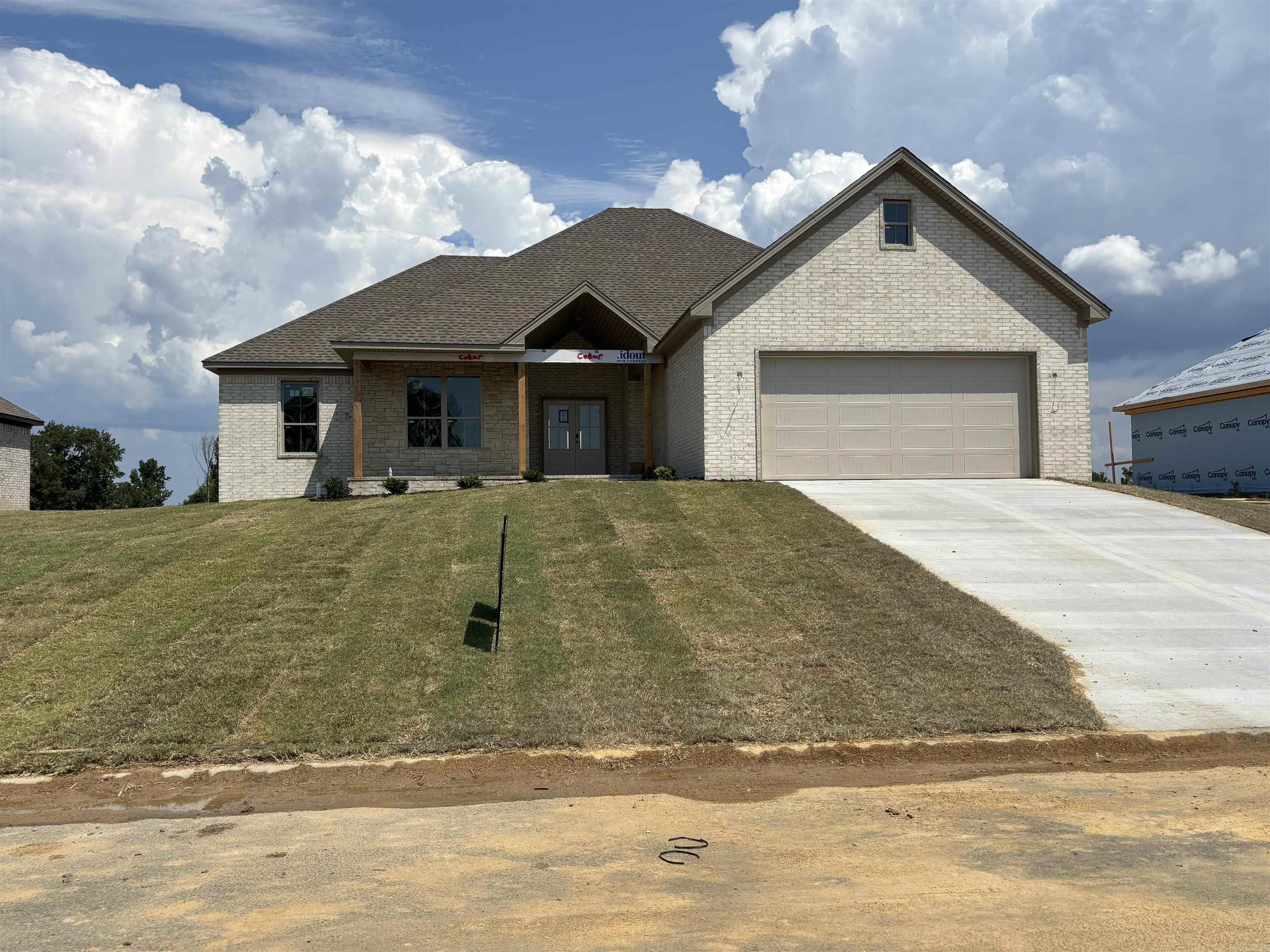 Welcome to a spacious 4 bed, 2 1/2 half bath, split floor plan and open concept home that is approx 2095 sq ft. Nestled in the Hidden Valley Estates Subdivision, this modern accented home is perfect for entertaining and hosting friends and Family! From the front door you will be welcomed into the living room, to the right is the kitchen and dining area. The master is off the Dining room and it wraps around from the master bath, to the master closet, into the laundry room and through the hall way to the 1/2 bath back to the mud bench area and garage. Guest rooms and guest bath are to the left of living room. Large front and back porches. Oversized garage to fit those taller vehicles. Also, the upcoming Community pond is behind this property!! **MOOD BOARD AND FLOOR PLANS ARE ON FILE**