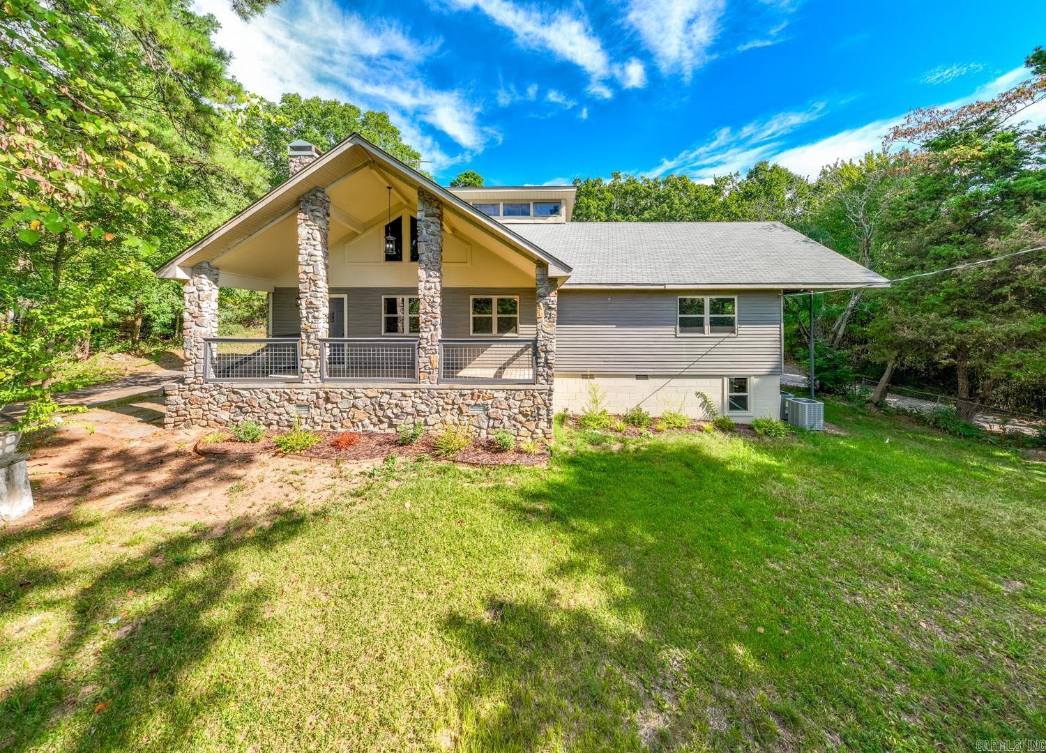 Can you imagine having 1.5 Acres in a Park-Like setting in the heart of West Little Rock & being close to everything yet feeling like you're away from it all with incredible privacy? Would you love the ability to have a huge garden or tons of space to build a pool or tennis courts or have all of them at once? There is a nice size shop with electrical already but you could add an even larger one if you wanted! The sky seems to be the limit here & it could also be used as Commercial Property if you chose. This is truly a unique opportunity to have such space & privacy yet have the convenience to anywhere you need to go. Once inside, you will immediately feel the warmth & coziness of the newly remodeled spaces featuring a large kitchen with vaulted ceiling with tons of natural light and windows looking out to both sides of the home. The Main Level features the Master Bedroom, 2 oversized guest rooms (one with huge walk-in closet) & 2 remodeled bathrooms while the Brand New Upper Level features the 4th Bedroom, Nice Bathroom & Wonderful 27' x 12' Bonus Room with additional large storage closet. There's also a large utility room with a sink & loads of countertop space. Don't Miss this!!