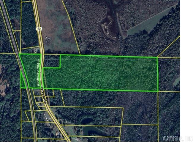 Great opportunity to own ~38 acres near downtown Little Rock. Full of mature timber, mostly hardwood behind the pine, which you see from the Highway, and wildlife, own and use as recreation land or develop for housing. Great access, this will not last long!