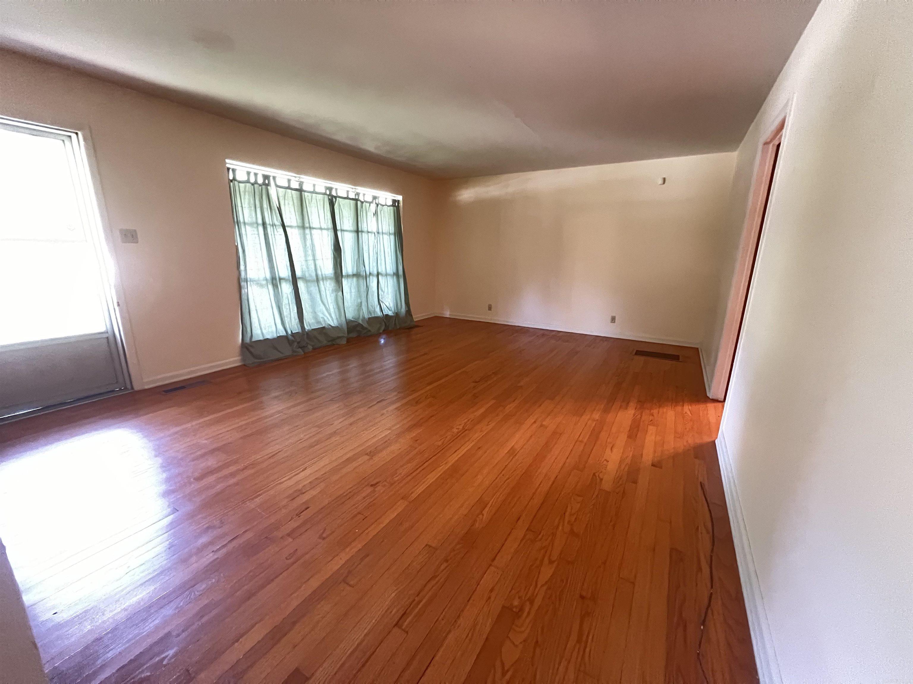 Built in 1965, this Little Chicago cutie is waiting for your updates to make it your very own. All brick home has beautiful hardwood floors. The 3 bedroom, 1.5 bath could also be a 2 bedroom with a dining room or office. Primary bedroom conveniently has the half bath en-suite. So easy to suit to your specific needs in this comfy 1272 sq. ft home with large back yard. Close to all the shopping you need - WalMart, Kroger, and a plethora of restaurants - you will never need to stray far from home. Storage shed in back yard conveys and there is extra storage on the carport.