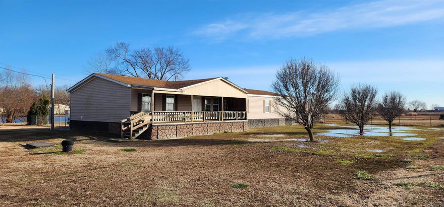 PROPERTY IS BEING SOLD WITH 403 SFC 517. 473 SFC 517 AND 403 SFC 517 WILL BE SOLD TOGETHER AS ONE PROPERTY.  473 SFC 517--This property is part of the 47.52 acre homestead.  The home has been meticulously maintained and cared for since it was new.  There has only been one owner.  Many updates and upgrades have been done to the home.  These include new flooring, electrical, roof, and front porch.  The home features 4 or 5 bedrooms, 2 living areas, gas log or wood burning fireplace, a 2 car detached garage with small workshop attached.  This home has everything that you need and nothing that you do not.  The yard features several fenced areas for livestock and it sits on a beautiful 9 acre lake that is teaming with every freshwater species of fish that you would want to target.  The defining characteristic of this property is its ability to be used as a duck hunter's oasis.  In conjunction with the other homes on the property that will convey with it, at this list price, it makes it a perfect piece of property to be used for duck hunting.  If duck hunting isn't your thing, the homestead really is perfect for relaxing.  Come see this perfect piece of property today.