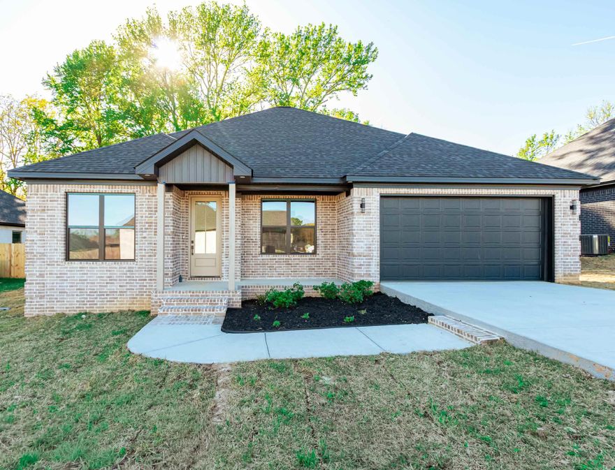 Jacksonville New Home! Enjoy this stunning new construction by Charles Anderson Homes! This residence boasts every luxury you could desire. The foyer opens up to a spacious Great Room with an inviting open floor plan and a stylish recessed electric fireplace. The kitchen and dining area showcase beautiful Quartz countertops, a range alcove with surround, and a large island that serves as additional dining space. Enjoy exquisite ceiling and cabinet fixtures throughout the home. The private Master Suite features double vanities, luxury vinyl flooring, a garden tub with upgraded tile surround, a custom tile shower, and two walk-in closets. On the opposite side, you'll find two bedrooms along with a guest bath and laundry room. Step outside to the covered porch, complete with an outdoor fireplace for cozy evenings. Plus, enjoy peace of mind with a One year Home Builder's Warranty!  Professional pictures coming soon.