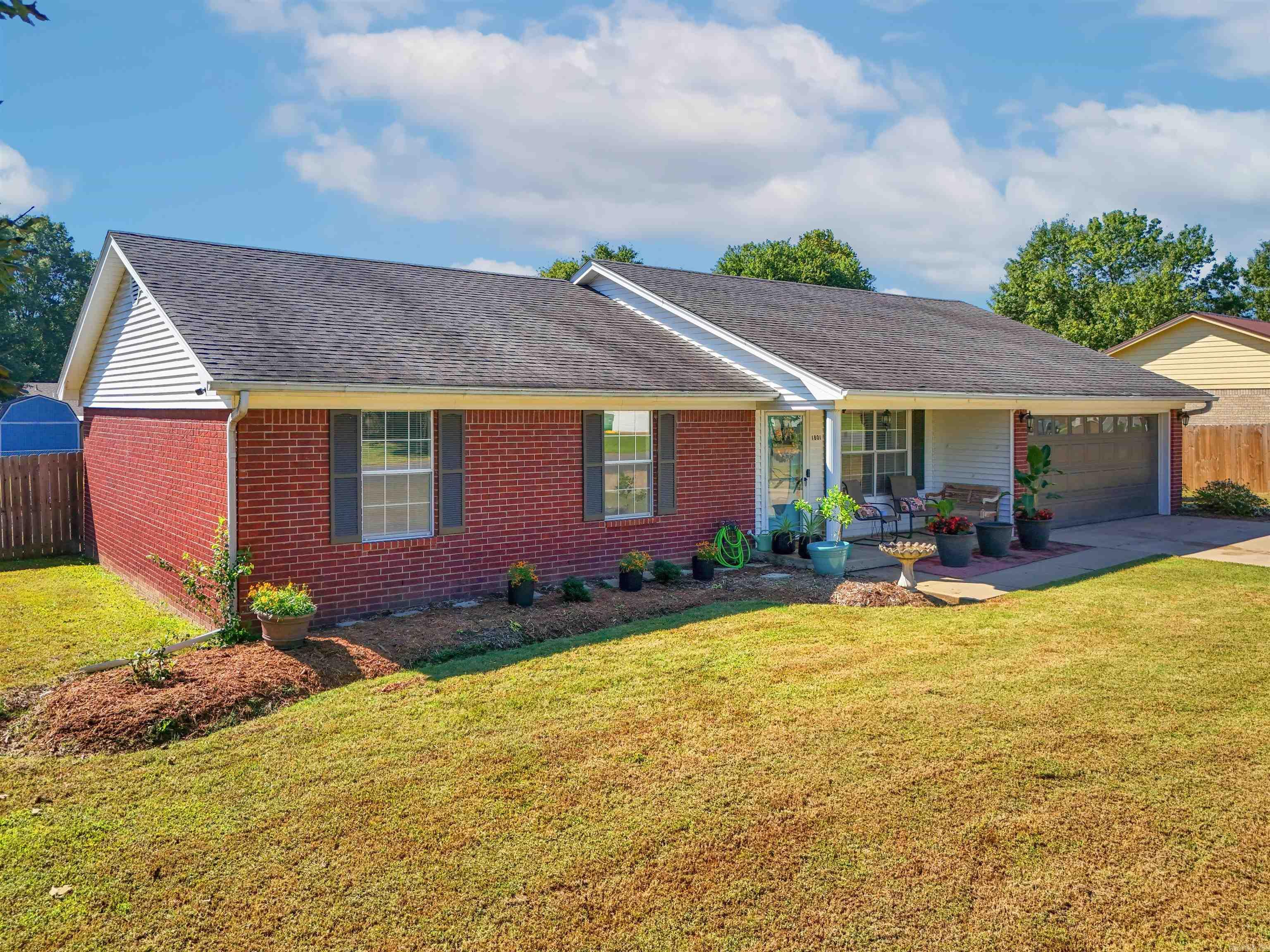 Charming home on a large, corner lot near shopping, interstate, restaurants and more! New flooring, new paint, no more popcorn ceilings, new sinks, fresh landscaping with a fire-pit, heated/cooled sunroom, enclosed catio, and storage building! Check out the 3D tour and aerial drone footage. Call today to make it yours!