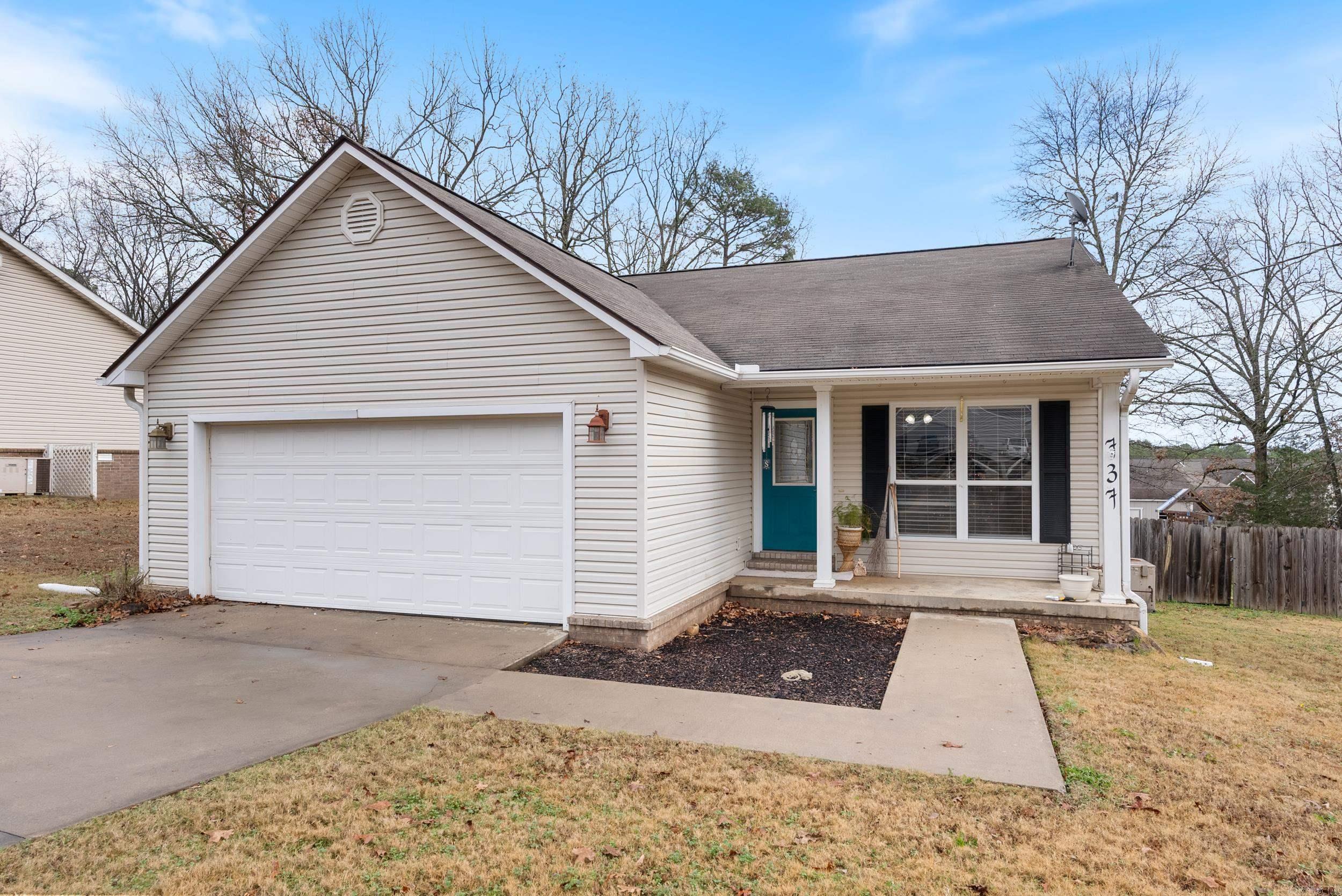 Don’t miss this 4-bedroom, 2-bath home just minutes from several Greers Ferry Lake access points! Spanning ~1500 sq. ft., the property boasts a large backyard with a 30-ft round pool, surrounded by a custom bi-level deck with a natural gas hookup - perfect for effortless cookouts and pool parties. A new (2024) 5-burner natural gas grill conveys with a reasonable offer.  Inside, you’re greeted by abundant natural light, wood floors, and a stunning kitchen featuring custom knotted hardwood cabinets. Recent upgrades include a dishwasher (2021), microwave (2023), water heater (2024), and plush Stainmaster SOS Durable Touch II carpet with Elite Duraplush foam pad (2024).   The backyard shed conveys, and the privacy fence ensures seclusion. Bonus features include partially floored attic space (over 1/2 the garage).  A pre-sale home inspection by HomeTeam was completed on 12/16/2024 and is available to interested buyers. This home offers the perfect blend of comfort, style, and functionality! Agents see remarks.