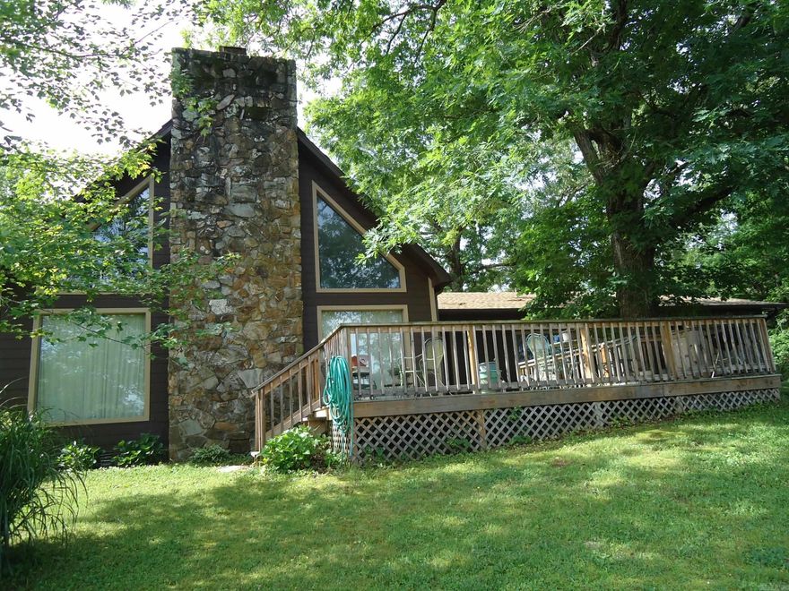 This ranch home sits on a beautiful 6-acre+/- land tract, just off North Moore Road. 3 bedrooms and 2.5 baths. You will fall in love with the great room with very large stone fireplace and a high vaulted cathedral ceiling. Nice sized kitchen with breakfast area. Lots of kitchen cabinets and built ins. 3 bedrooms on the main level of the home. Primary bedroom is nice and specious. Primary bath is good size with double vanities and makeup area. 1.5 baths, set up like a Jack & Jill style but separate from the two bedrooms. There is a large bonus loft area with nice stairway and overlooks the great room. This area could be an additional bedroom or hobby area. Large windows overlooking the back exterior yard area of the home. Oversized 2 car garage with overhead door. Also paved area for additional parking. Property has a large pond and wood board fencing in the front area. Older small stable in need of repair and a separate small workshop. There is a storage/workshop area, with slab, under the real side with an overdoor for lawn equipment. Square footage, age, and taxes are taken from county records. Feel free to verify. Taxes are before Homestead credit and fixed for current owner.