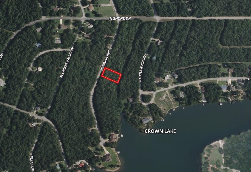 Horseshoe Bend Lot Near Crown Lake Affordable, wooded building lot located at 1402 Michigan Ave. This property is close to Crown Lake and has a downslope, perfect for a walk-out design. Owners pay $80/year to Parks and Recreations. Buyer to receive a limited warranty deed.