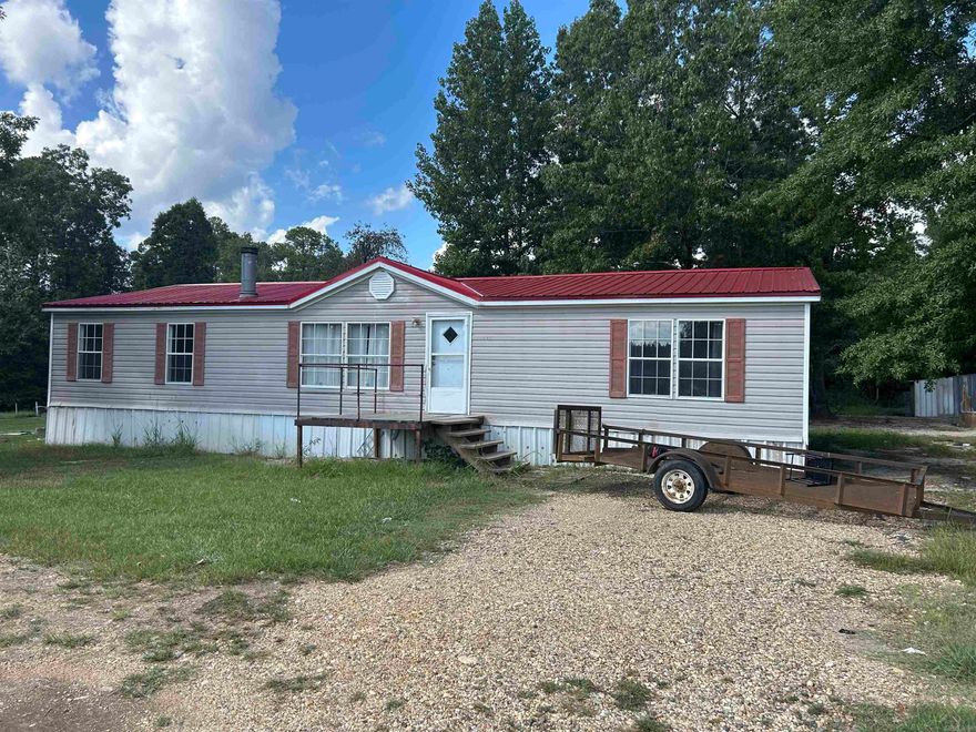 Quiet 5 acres with mobile home. Not far from town. Call me for an appointment.  870.314.2286