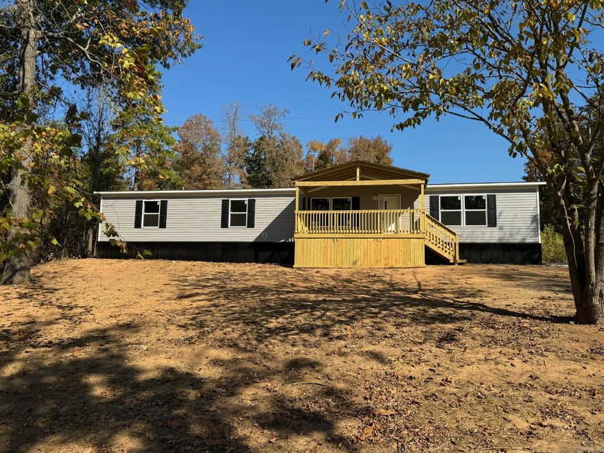 Brand new 4 bed 2 bath home on .38 acre,  New manufactured home. on permanent foundation, covered 8x18 front deck, 10x16 back deck. Has storage shed in back.  Ready for your family to call home.  Just minutes from Lake, boat access. Call for a private showing. Lenders available for you to use if needed.