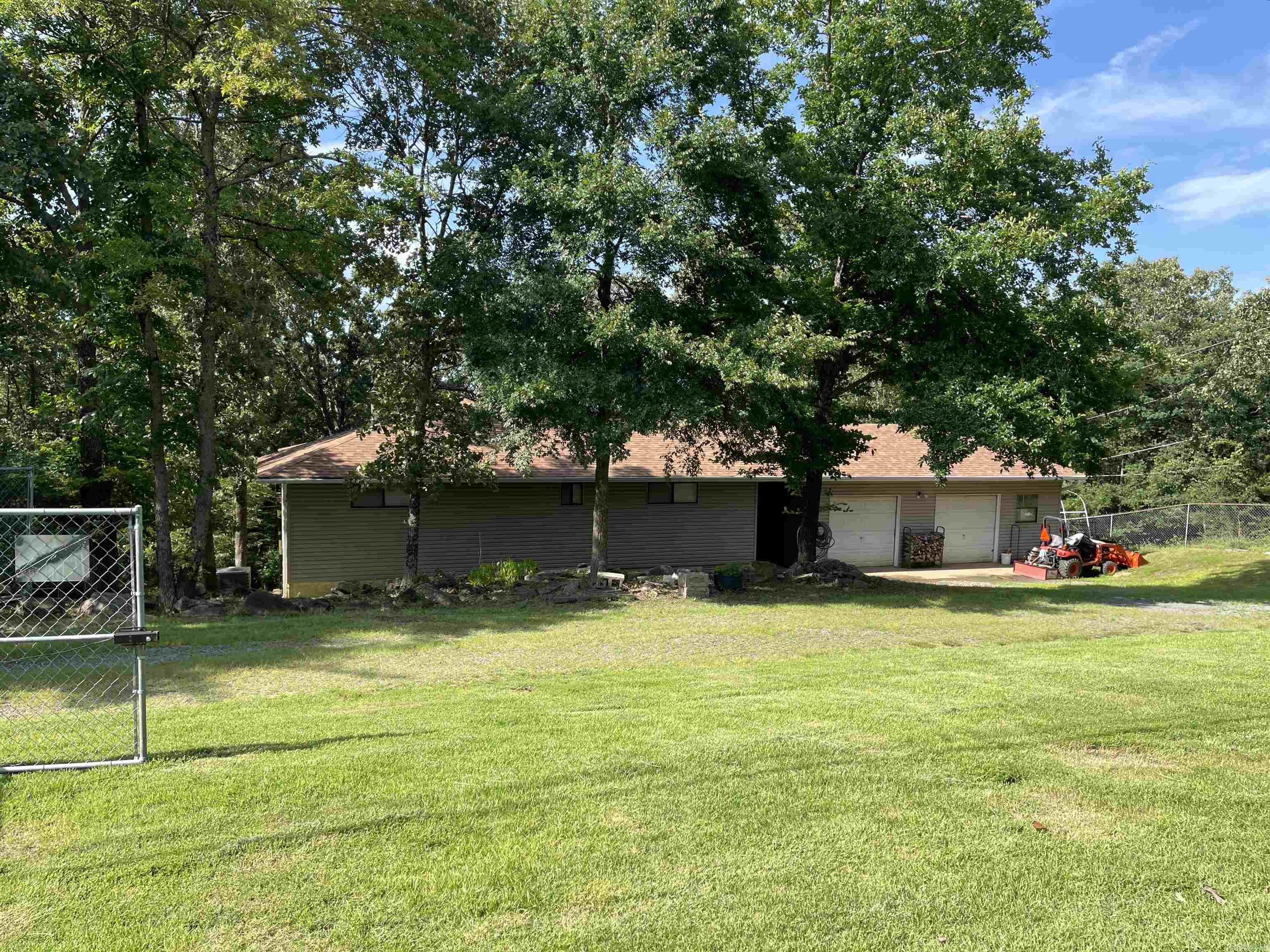 LISTED PRICE IS THE STARTING BID ONLY! This home will sell at auction, on Friday, July 18th, at noon. Contact Listing Agent/Auction Company for more Auction Information. This incredibly unique home is up for sale at auction! It sits at the end of a cul-de-sac in a truly beautiful area. With 1,848 square feet, the home has 2 bedrooms and 2 full bathrooms. 2-car garage and a large deck to enjoy the peaceful setting.