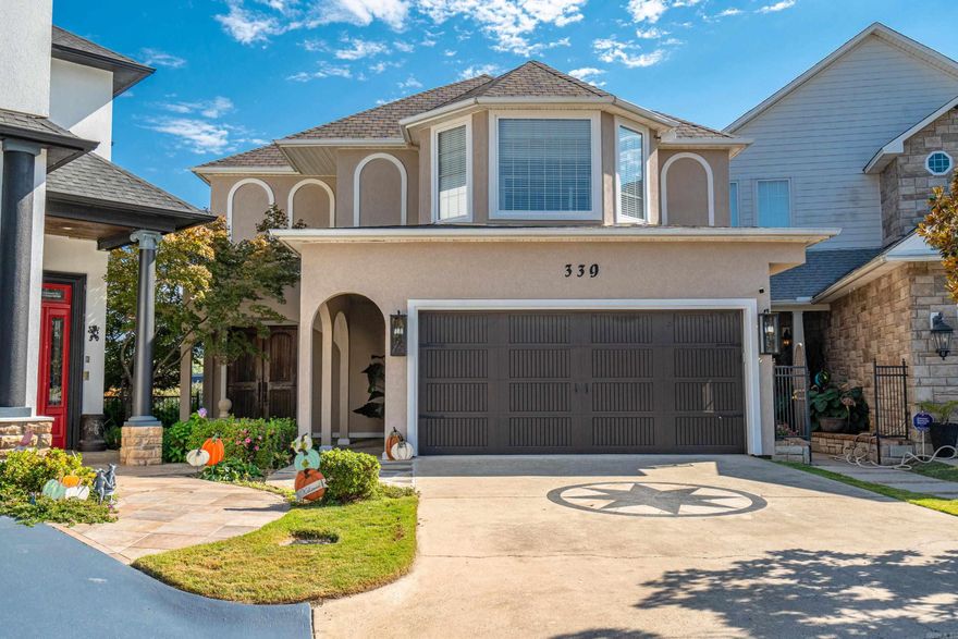 WELCOME to 339 Paradise Point! This Lake Hamilton Townhome offers impressive panoramic main channel views. Spacious interiorsand a modern design, complemented by high-end decor and elegant furnishings. Only excluding a few art pieces and personal items.making this home move-in ready. This Tri-Level stunning property boasts 4 bedrooms/4 baths and a half bath. A gourmet kitchen withpremium appliances. Granite Countertops, Custom Cabinetry, Spacious Layout, breakfast bar and High-end Features, offering bothpracticality and luxury. Laundry located on both upper and lower level, Double covered boat dock, waverunner dock both included withthe purchase. Schedule your private tour today. See agent remarks for list of updates