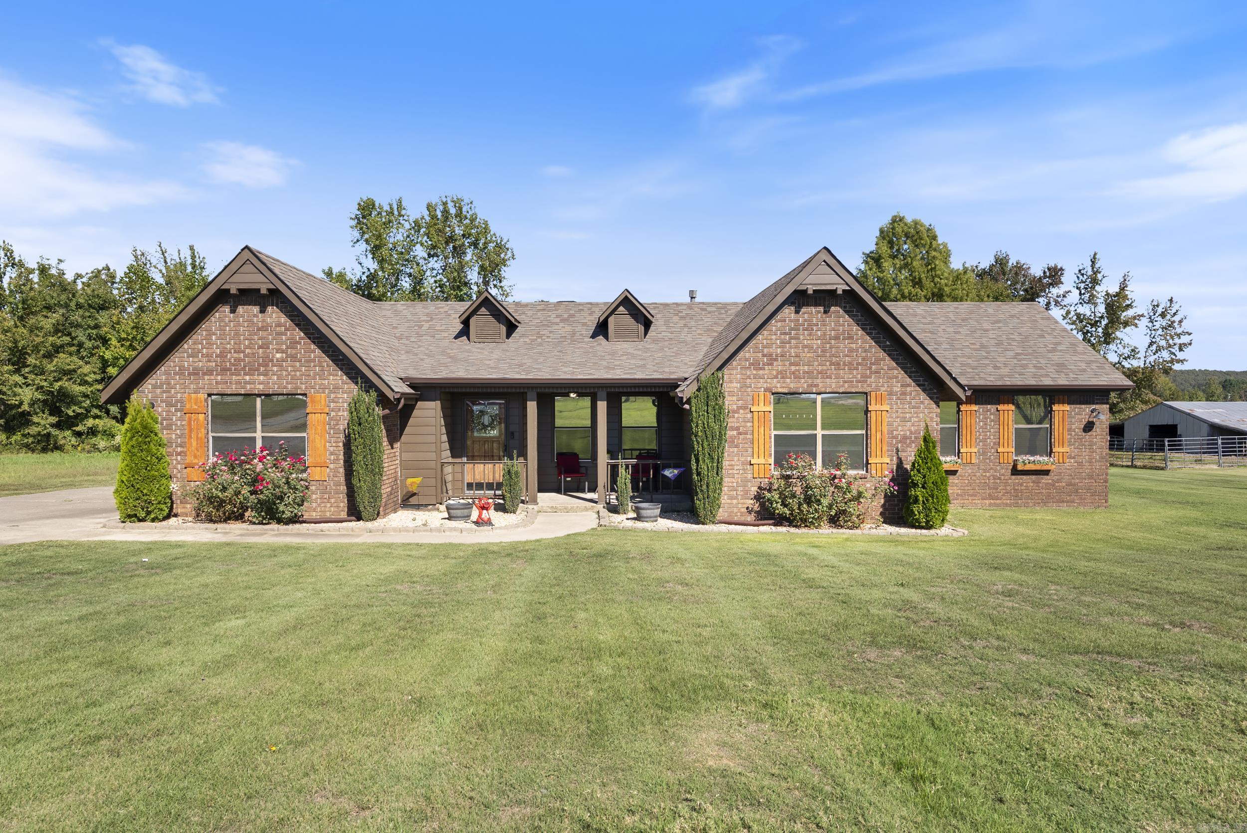 Open the doors to this charming 3 bedroom, 2 bathroom home nestled on 4 acres with a total 20x50 shop. Inside, you’ll find a spacious living room centered around a cozy wood-burning fireplace, roomy bedrooms with walk-in closets, and an updated kitchen designed for both style and function. Beautifully remodeled in 2022, this home has so much to offer, featuring professional interior and exterior paint, new luxury vinyl plank flooring, updated lighting, doors and hardware, tinted windows, a new gas water heater, granite countertops, and stainless steel appliances. The central heating and air unit, along with all ductwork, was also replaced in 2022. The fireplace was fully inspected and swept in 2023, complete with a custom chimney cap for added peace of mind. Step outside to your own private retreat, the backyard is perfect for entertaining or relaxing, featuring a large deck and a covered outdoor bar or BBQ area. And don’t forget the shop, offering the extra space you’ve been looking for! The shop is split into a 20x40 with an additional 10x40 split on the back side. To top it all off, this home includes a new roof and gutters installed in 2024.