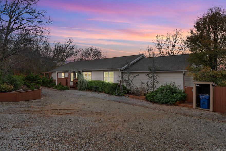 Spacious 4-bedroom, 3-bath home on 4.46m/l acres in Gamaliel, just minutes from Norfork Lake access. The main level features an open layout and a large bonus room, perfect for a game room, or hobby space. The finished lower level offers its own kitchen, living area, bath, and additional washer/dryer hookups—ideal for guests or extended family. Two garages plus two detached garages provide excellent space for workshops, lake toys, or boat storage. Peaceful country setting close to lake recreation—this home offers the perfect blend of space, comfort, and convenience in the heart of the Ozarks.