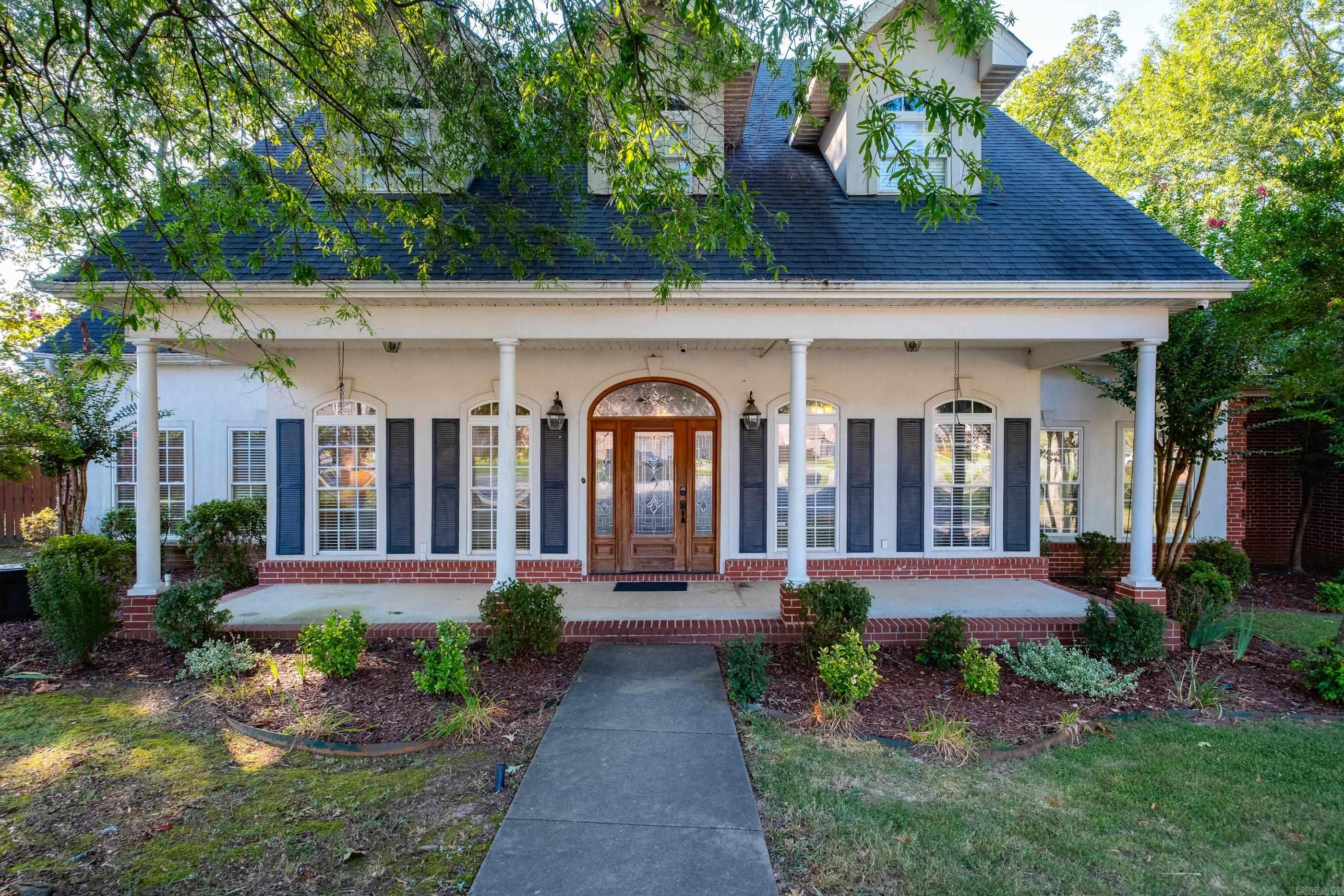 This fabulous home sits on oversized cul-de-sac lot in heart of desirable Longhills subdivision offering privacy, space, & a centralized location. Updated kitchen is truly the heart of the home, featuring 2 large islands, generous eat-in area, modern oversized refrigerator, & stunning exposed brick arches. Kitchen flows seamlessly into 2 spacious living areas, ideal for everyday living & entertaining alike. With 6 total bedrooms, including versatile office/6th bedroom, this home offers flexibility. Extra guest bedroom on main floor is perfect for younger children or anyone needing ground-level accommodations. Upstairs features 3 additional bedrooms, plus game room & media room, perfect for fun, work, or relaxation. Luxurious large primary suite offers a true retreat, complete w/3 walk-in closets & chandelier-lit soaking tub. Storage abundant throughout, w/walk-in closets, additional storage room off laundry area, & added one-car garage for even more space. For peace of mind, garage features built-in storm shelter. The backyard is a dream boasting two play structures & screened-in back porch with a hot tub that conveys with the house ā the perfect spot to unwind. Call today!