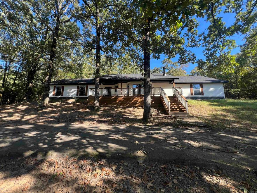 Looking for some acreage in a quiet setting? This 3/2 home sits on 1.5 acres! In the kitchen, you will notice the open concept with a large island and stainless steel appliances. With a new roof and hot water heater, this house is ready for you!  6 and 12 month lease options