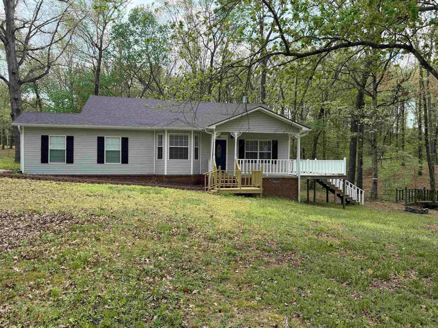 Charming, 3bed, 2 bath remodeled home on 1.7 acres offering a country feel close to city amenities. Recent updates include flooring, painting, kitchen with appliances, NEW ROOF and improved outdoor living with refurbished deck plus brand new back deck. The setting gives you room to breathe. Clean, Cute, & ready for its next owner.