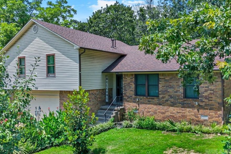 This updated home has two living areas, a large lot with plenty of parking on the drive way, an additional parking pad that opens into the backyard for extra cars, boats, or other motor toys and a heated and cooled large 2 car garage. Fresh paint and updates has made this one move in ready. 12 month lease required. The den offers a great fireplace and the back covered deck is awesome for a family who enjoys entertaining and being outdoors. There are 2 storage sheds out back for extra storage as well.