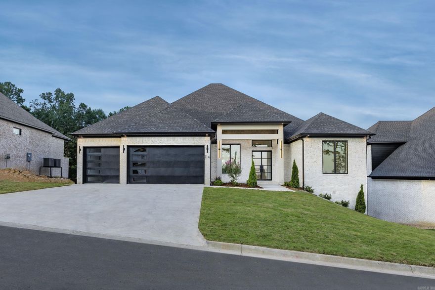 Amazing New Construction Home in Chenal Valley with luxury finishes and a great floorplan.  Stunning Double Entry Glass Doors.   Amazing Chef's Kitchen with high end appliances, Frigidaire Professional All Freezer/All Refrigerator Unit, Double Ovens, 5 burner gas cooktop, icemaker, pot filler, huge island, microwave drawer and walk-in pantry.  Formal Dining w/ Feature Wall.   Butler's pantry just off kitchen w/ beverage cooler & bar sink.  Contemporary fireplace in Great Room.   Two large covered patios overlooking greenspace in backyard.   Main Level Patio has outdoor kitchen w/ built-in grill, side burner & a sink plus a fireplace.   Spacious Primary Suite has two primary closets, a soaking tub, linen closet, large walk-in shower.  Large Laundry Area connected to Primary Suite.  5th Bedroom/Office has loads of natural light and large closet.  Large Media/Bonus area upstairs with wet bar & beverage cooler plus another bedroom. Quartz Countertops, Hardwood Floors and Smart Home Features throughout home.  Zoned High Efficiency HVAC units & tankless hot water heater.