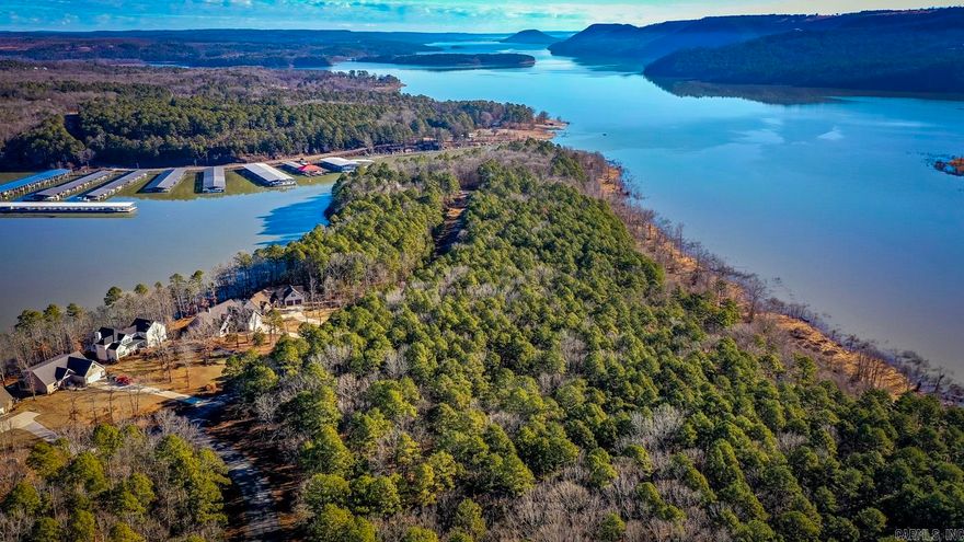 BEAUTIFUL SPOT TO BUILD YOUR DREAM HOME ON GREERSFERRY LAKE WITH A GENTLE SLOP TO THE WATER. GATED COMMUNITY. SOME RESTRICTIONS. AGENTS SEE REMARKS