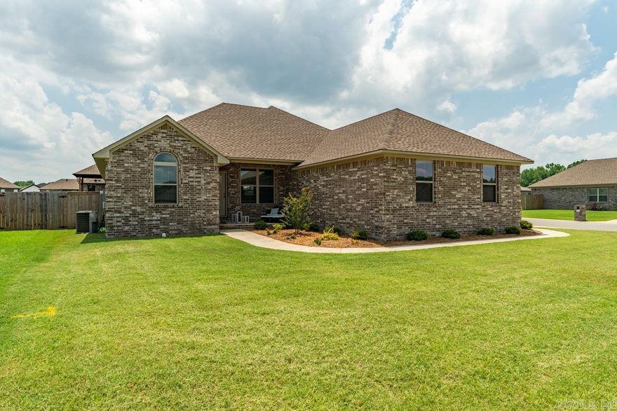 Race over to Rope Trail. You do not want to miss this 3 bed, 2 bath home, seated on a quarter-acre corner lot in the favored Jaxon Terrace subdivision of Jacksonville. From the entry you're greeted with stunning natural light, tasteful modern design, and an open concept floor-plan that maximizes on every inch of space. Split floor-plan tucks your master off where you're greeted  with an an elegant tray ceiling. The primary bath suite will sweep you away. Enjoy double vanities, split by your soaker tub, storage galore-2 walk in closets, plus walk-in shower and private toilet closet. 2 guest bedrooms are set apart, one w/ vaulted ceiling, feature great closets, plenty of light, and are split by the tasteful guest bath. At the backyard, enjoy an oversized covered back porch that looks out to your large flat, fully fenced backyard. Don't miss the large laundry & mudroom space off the garage. Enjoy all the perks of new construction, at a better price, and save on improvements like a fence, blinds, and more. Don't miss this stunning home!