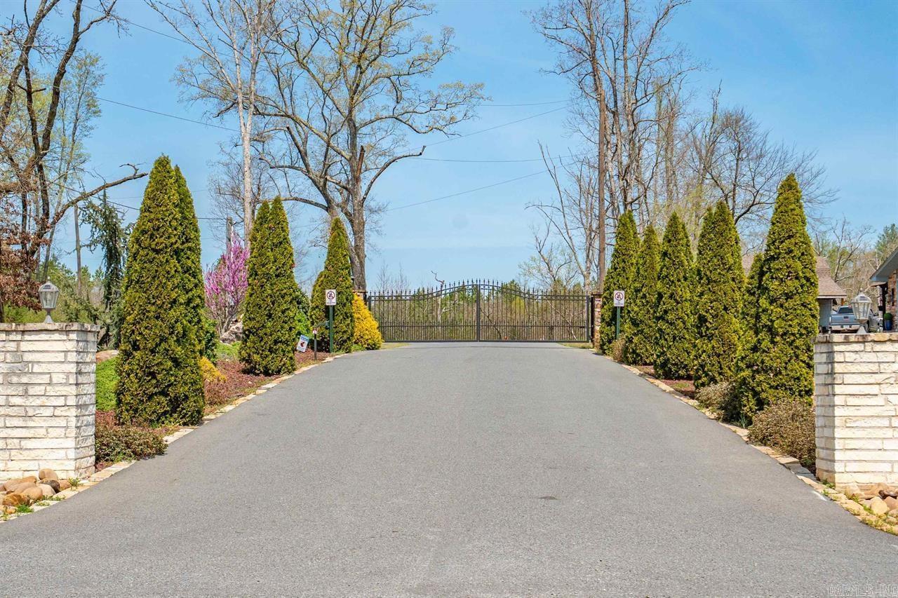 BARGAIN PRICE!!! MOTIVATED SELLER!! $55,000 FOR 5 ACRES IN HIGHLY SOUGHT AFTER GATED OTAZA SUBDIVISION WITH SHARED LAKE IN FOUNTAIN LAKE SCHOOL DISTRICT! THIS NEIGHBORHOOD HAS BEAUTIFUL NEW OR NEWER HOMES! IT IS CONVENIENTLY LOCATED JUST A FEW MILES FROM FOUNTAIN LAKE SCHOOL DISTRICT, THE NEW BYPASS, AND THE BALBOA AND EAST GATES OF HOT SPRINGS VILLAGE! ABOUT 15 MINUTES TO HOT SPRINGS, ABOUT 20 MINUTES TO BENTON AND ABOUT 40 MINUTES TO LITTLE ROCK! THIS MOSTLY LEVEL ACREAGE LOCATED AT THE CORNER OF ELK MEADOWS DRIVE AND GROUNDHOG LANE IS READY FOR YOU TO START BUILDING YOUR DREAM HOME!! *ADDRESS IS APPROXIMATED AS RAW LAND DOES NOT HAVE OFFICIAL ADDRESS YET!