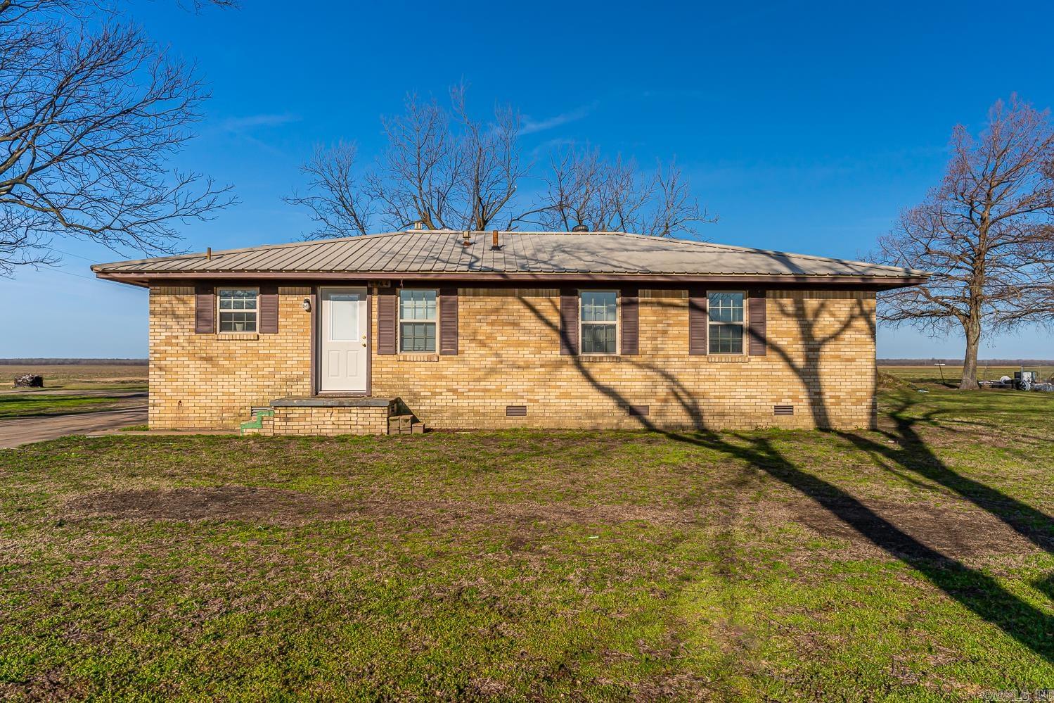 Welcome to the market 2844 CR 84 located on the outskirts Caraway, AR! This is a 4 bedroom & 1.5 bath and has such peaceful surroundings. The kitchen cabinets and countertops have been updated within the last couple of years and there is a ton of storage in the family room. There is also a storm cellar as well as a storage building on the property! This would make a great place to make a home and with a little TLC, you could put your own touches to it! Call your favorite Realtor today and let's go check it out!