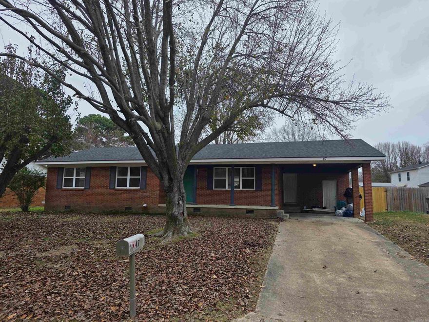 Three Bedroom, Two Bath, 1 Car carport with a large Deck that has been updated. Lots of new updates on this house.  New Roof, new flooring throughout the house, freshly painted , GFCI's installed.  A large fenced in backyard, A Brand New 12x20 Storage Building. Refrigerator and all appliances will remain with the house as well as the 65" tv.