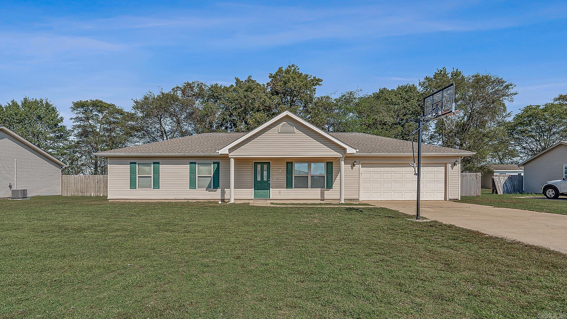 Charming 3-bedroom, 2-bath home with 1,392 sq. ft. located just steps from the city park! This well-maintained property offers a spacious two-car garage, comfortable living areas, and a functional floor plan that’s perfect for families or first-time buyers. Enjoy the convenience of being close to town amenities and recreation, all while having a cozy neighborhood feel. Priced to sell—don’t miss your chance to make this one yours! This home will qualify for all kinds of financing including $0.00 down.