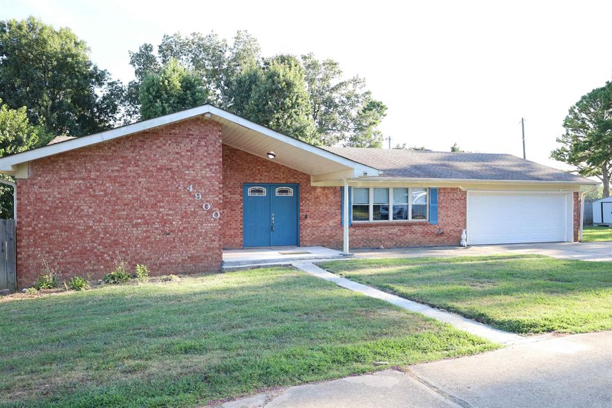 Discover this delightful brick home nestled in a peaceful Paragould neighborhood West of town. The large, open family room boasts new flooring that extends throughout the main level. The eat-in kitchen, adjacent to the family room, is well-appointed with granite countertops, abundant cabinetry, breakfast bar, and stainless steel appliances. The spacious primary suite includes a private bathroom, while two additional bedrooms and another bathroom are also located on the main level. The finished walk-out basement offers versatile living spaces, including two living areas and a bathroom. Recent updates include new flooring upstairs and downstairs, new plumbing, a new toilet downstairs, built-in bookcases, and a fifth bedroom addition. With a newer sump pump, dishwasher, and stove, this charming home is perfect for first-time buyers. Don't miss this gem at 4900 McPhill Drive, Paragould, AR—priced at $240,000!