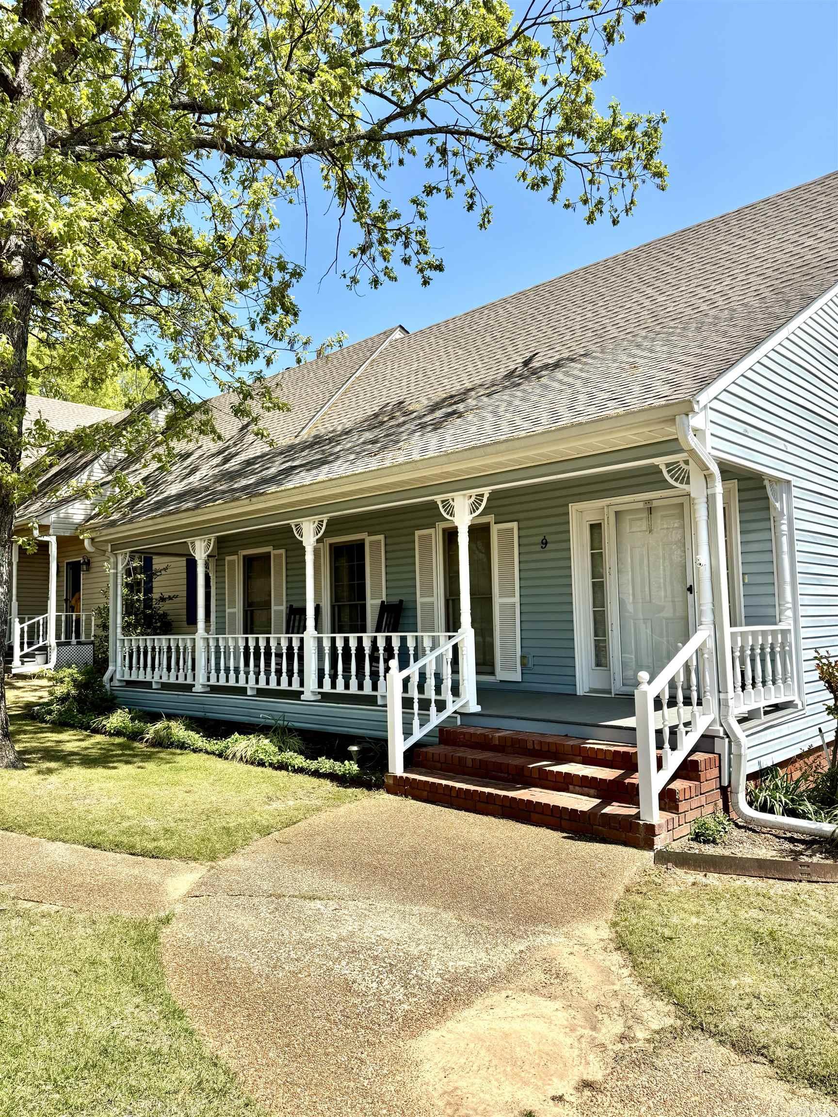 Welcome to this beautifully maintained traditional condo that blends timeless charm with contemporary comfort. A lovely front porch invites you in, setting the stage for relaxed, easy living. Inside, the open-concept kitchen, living, and dining areas feature rich hardwood flooring and plenty of natural light, perfect for everyday living and entertaining. The kitchen is a standout with stainless steel appliances, a convenient breakfast bar, and plenty of counter space for the home chef. Two spacious bedrooms and two full baths offer room to spread out, while the oversized laundry room provides extra storage and functionality. Step outside to enjoy the screened-in porch—ideal for unwinding in a bug-free outdoor setting—or take in the fresh air on the private rear patio. Two car garage with extra storage as well!! This one won’t last long. Agents, see remarks!