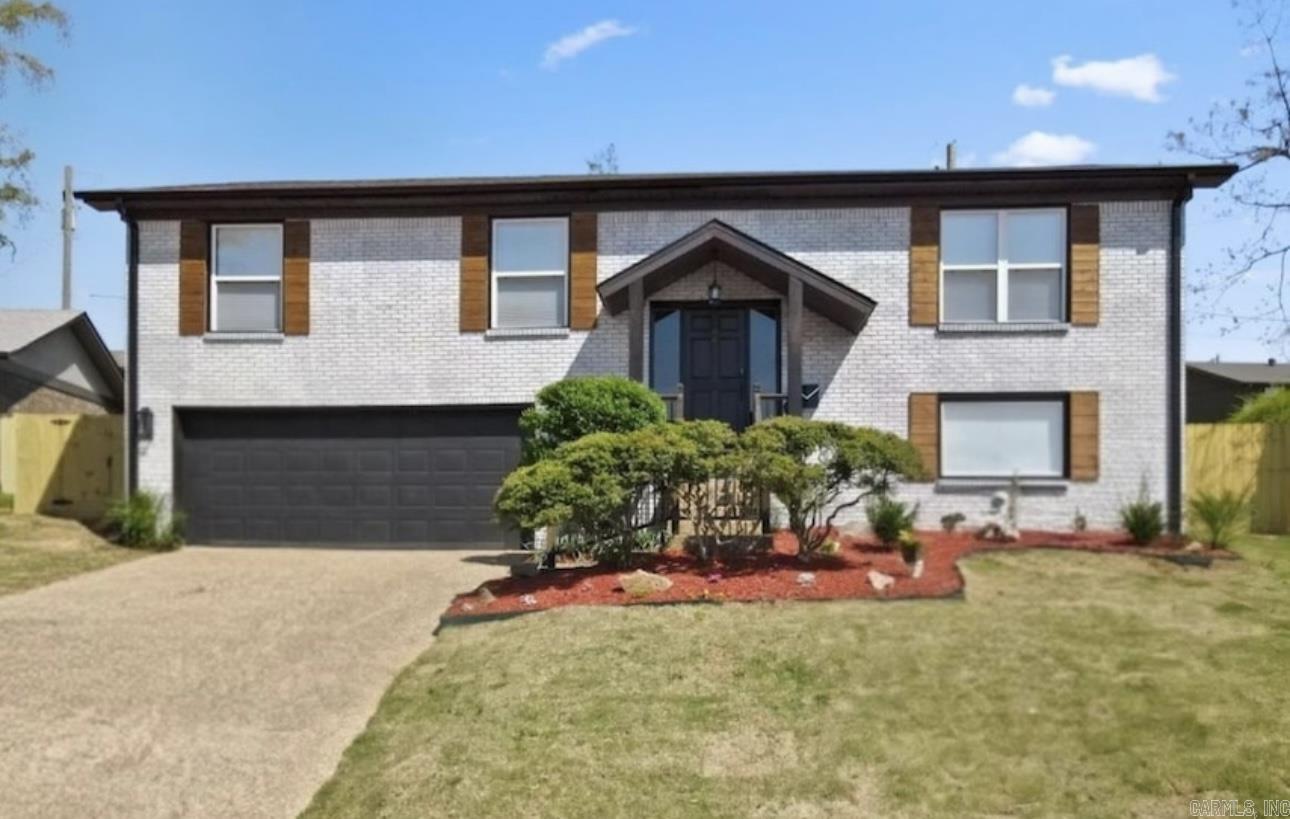 This stunning like-new 4-bed, 3-bath split-level home has been completely remodeled from the studs up! Featuring two luxurious primary suites, this home offers modern convenience and high-end finishes throughout. Enjoy dual HVAC systems for optimal comfort and Cat6 Ethernet wiring for lightning-fast internet. The 240V garage plug is perfect for EV owners or hobbyists. The chef’s kitchen boasts a gas stove, granite countertops, and an open-concept design flowing into the main living space with an electric fireplace. The spa-like primary suite downstairs includes a show-stopping walk-in closet. Control your landscape lighting from anywhere with the WiFi-enabled app. The home also features an app-controlled smart water heater, LVP flooring in main areas, tile bathrooms, and a fully fenced yard. *This home is only available as a rent to own. The seller will discuss with you the down payment for leasing to own when you inquire. Flexible terms available to help you build toward home ownership while enjoying all the benefits of a beautiful, move in ready property. Ask us today how you can qualify for the rent to own program and make this home yours today.