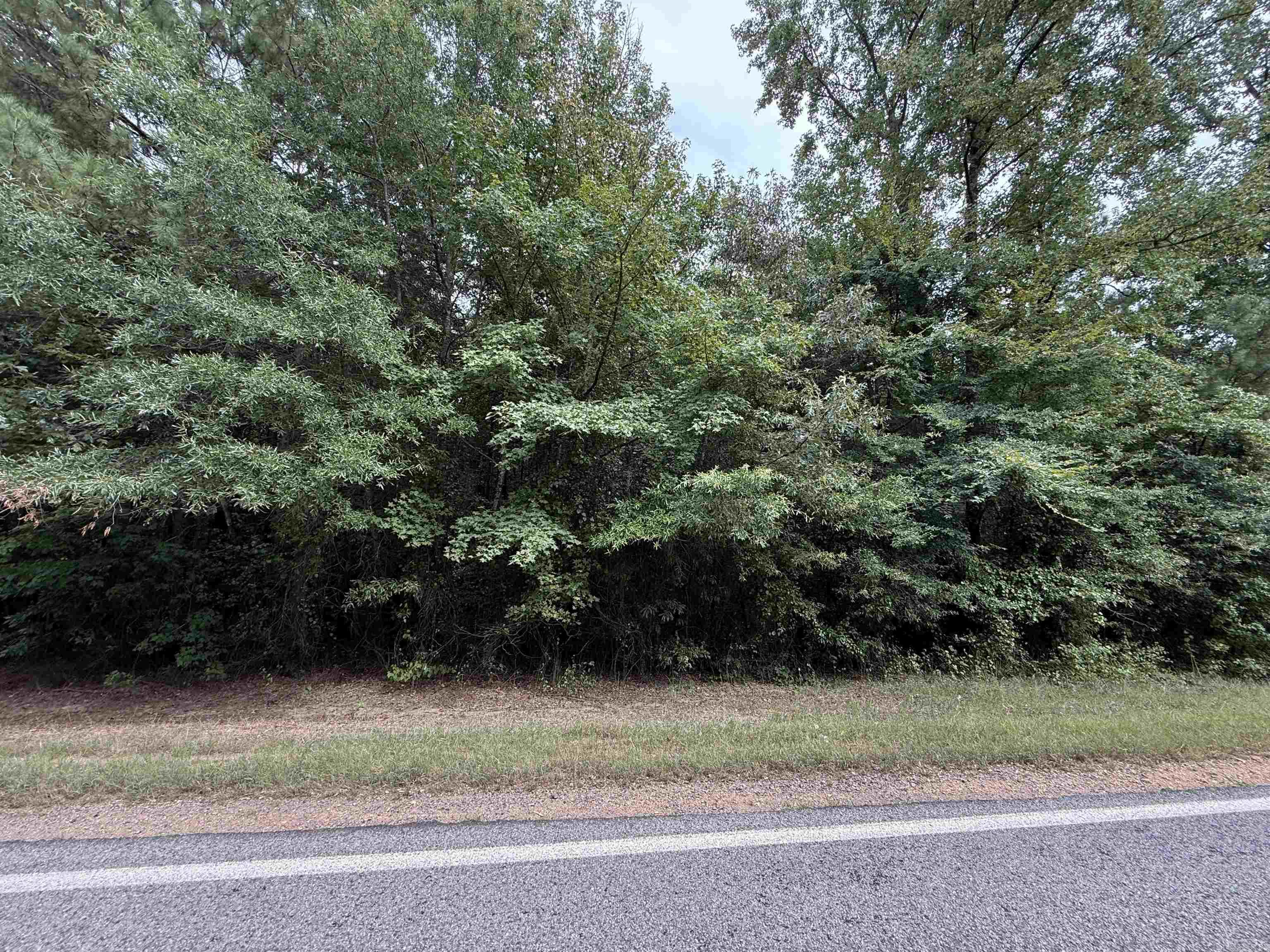 Approx 17.35 acres with highway frontage, highway splits acreage with approx 8 1/2 acres on each side of Highway 26 West. Land has unlimited possibilities. Contact our office for more details.