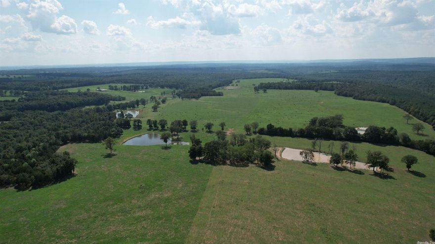 Beechfork Ranch at Hickory Flat has the unique distinction of being both a high producing cattle farm in fit and finish as well as a scenic retreat, loaded with outdoor recreation possibilities.  It marries the business and pleasure traits so seamlessly, you won't know whether to stare in awe at its' beauty or start working on your livestock plan.  It's a great piece of real estate for sure, but it's the details that really put it over the top.  Roads, drainage, fencing, cattle guards, herding lanes, barns.